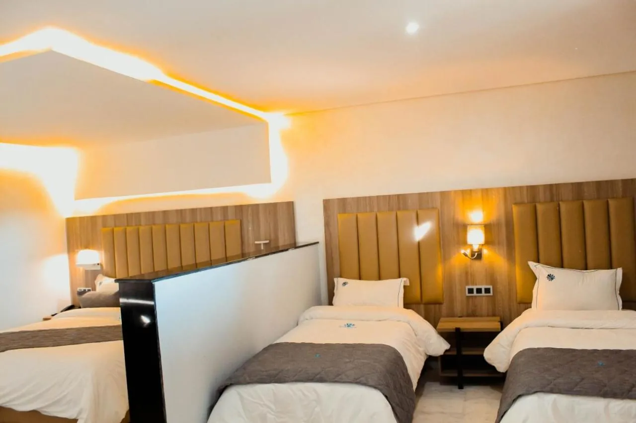 Bed in Hôtel La Perla