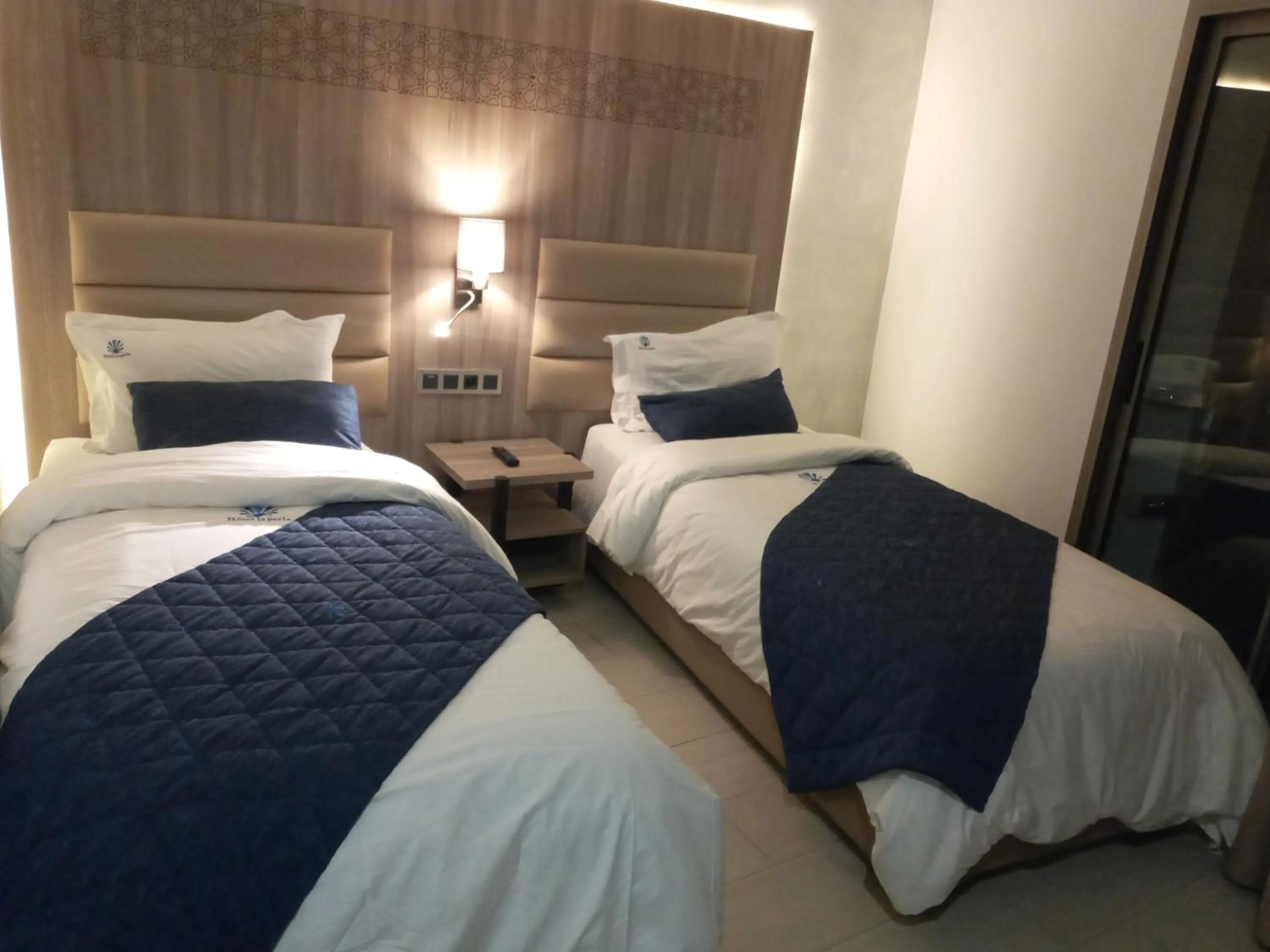 Bed in Hôtel La Perla