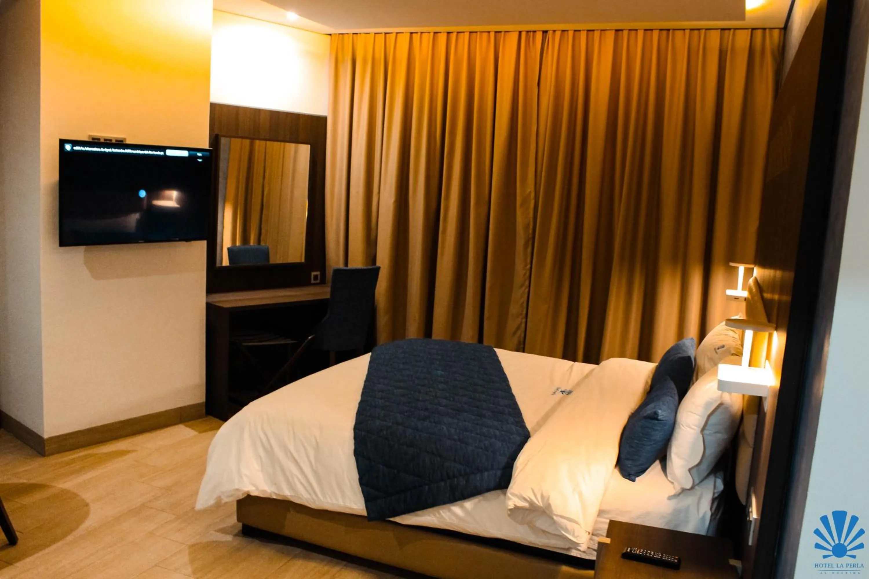 Bed in Hôtel La Perla