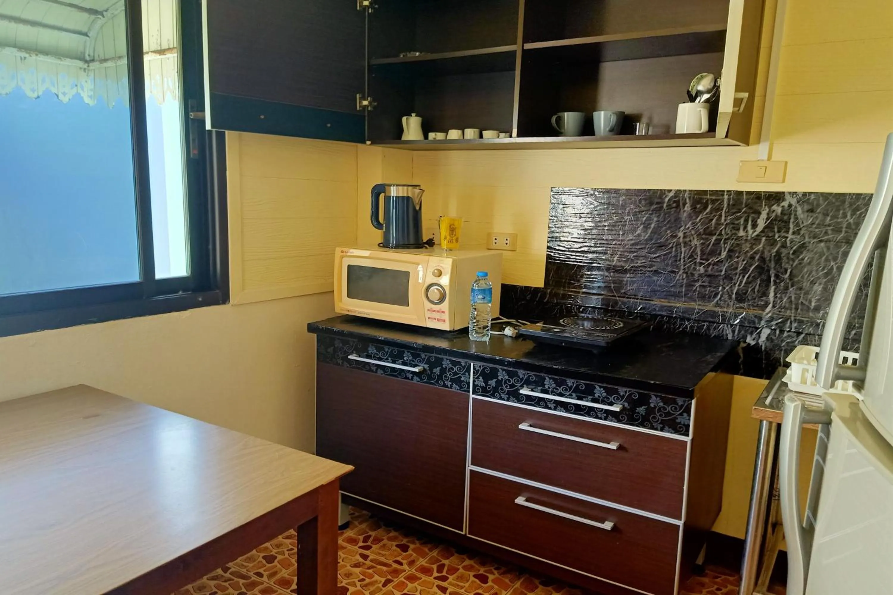 Kitchen or kitchenette in Sonya Residence