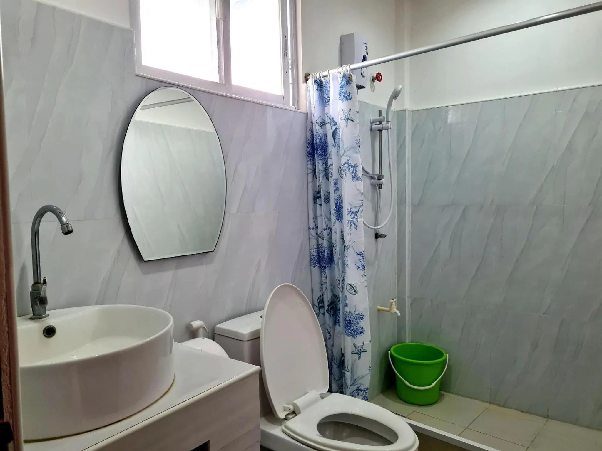 Bathroom in Alona Rose Hotel by SMS Hospitality