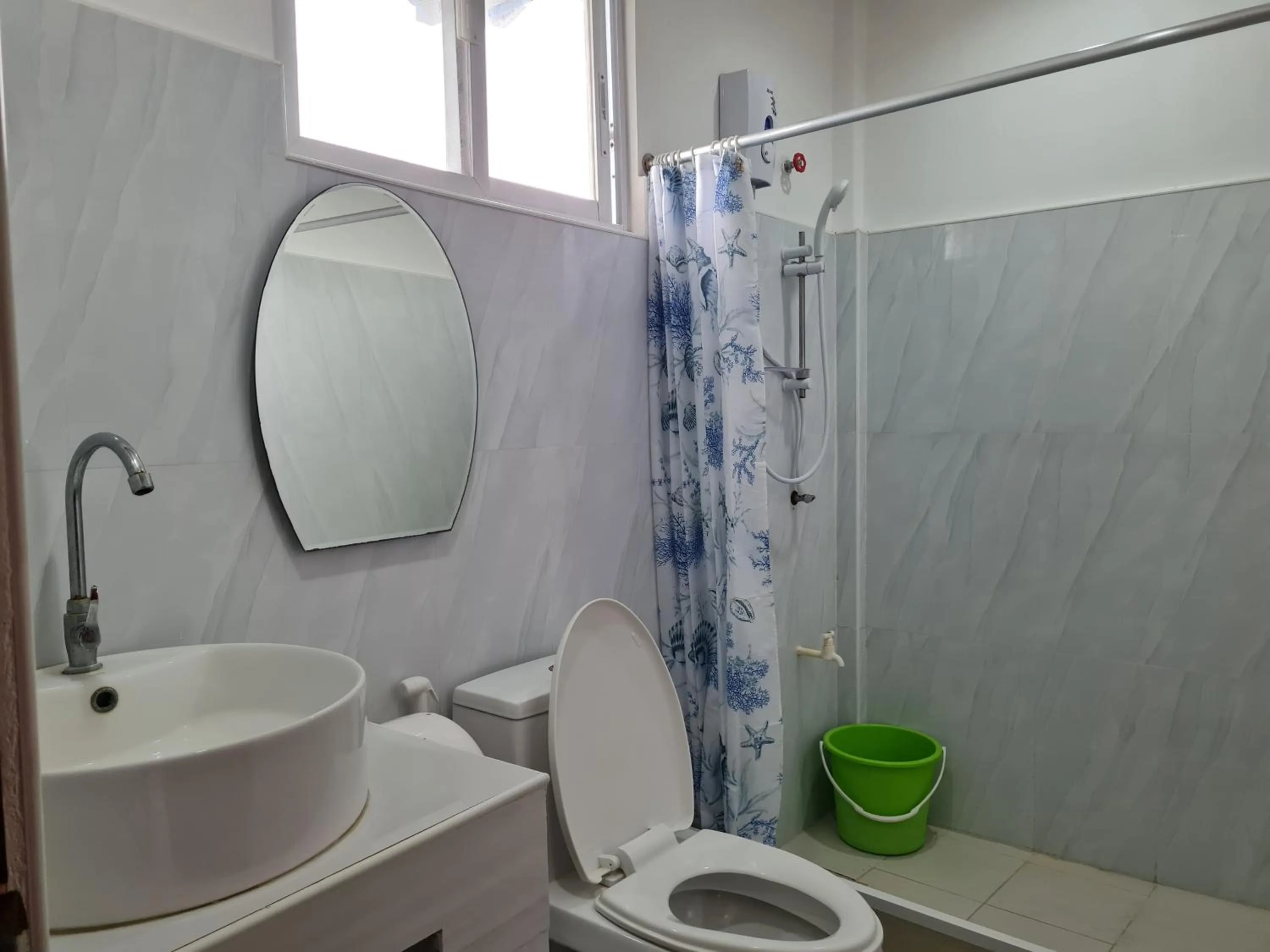 Bathroom in Alona Rose Hotel by SMS Hospitality