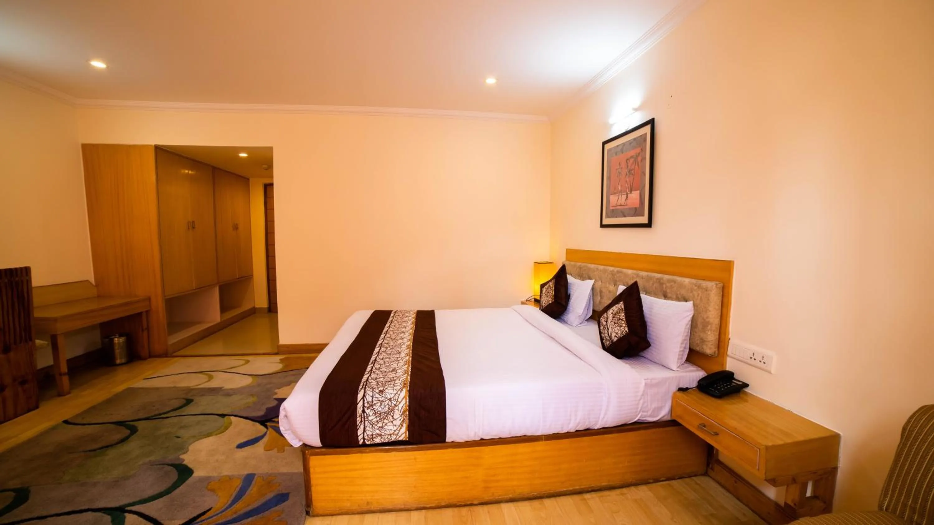 Bed in Vaayu Resorts And Spa