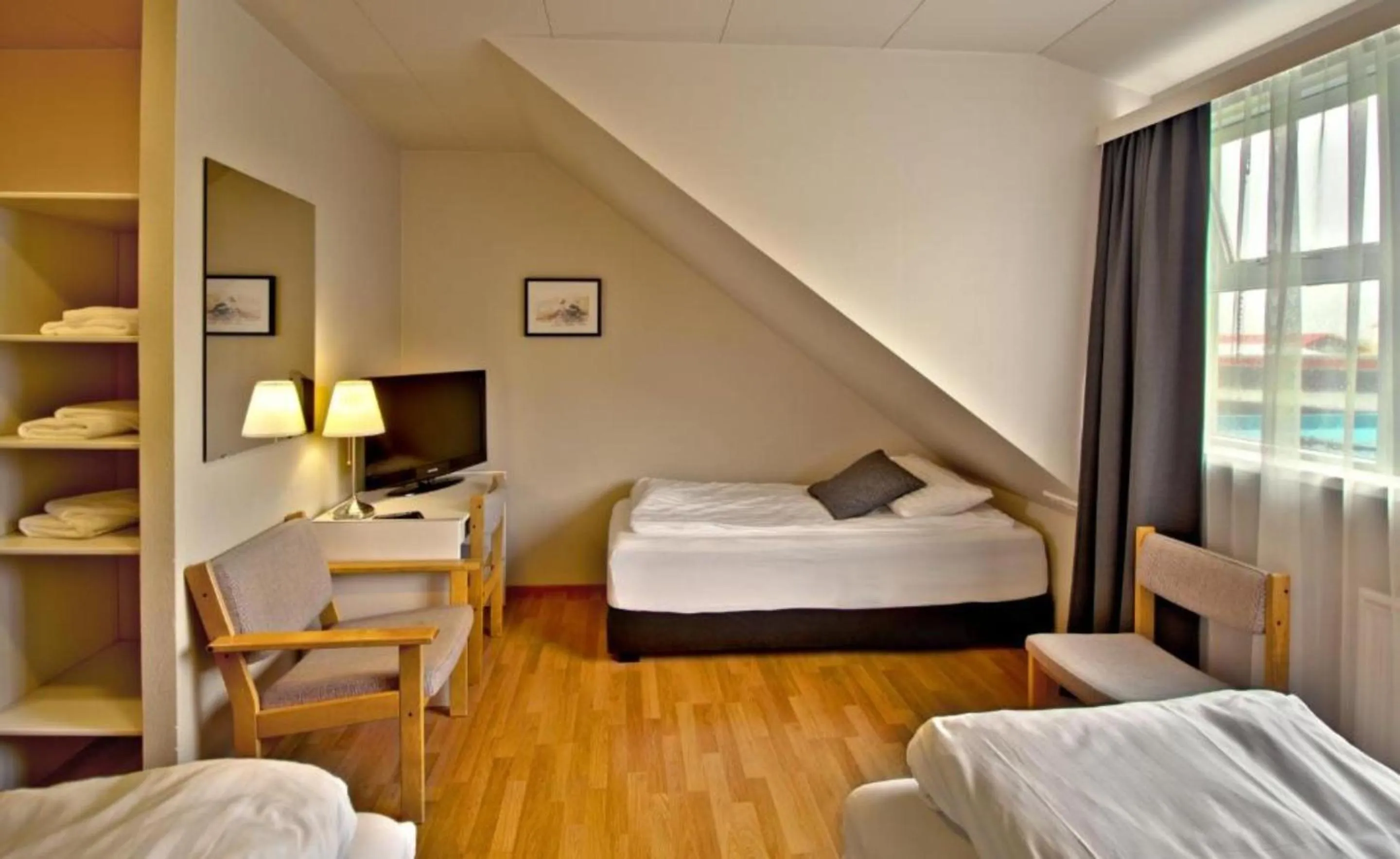 Photo of the whole room, Bed in Hotel Breiddalsvik