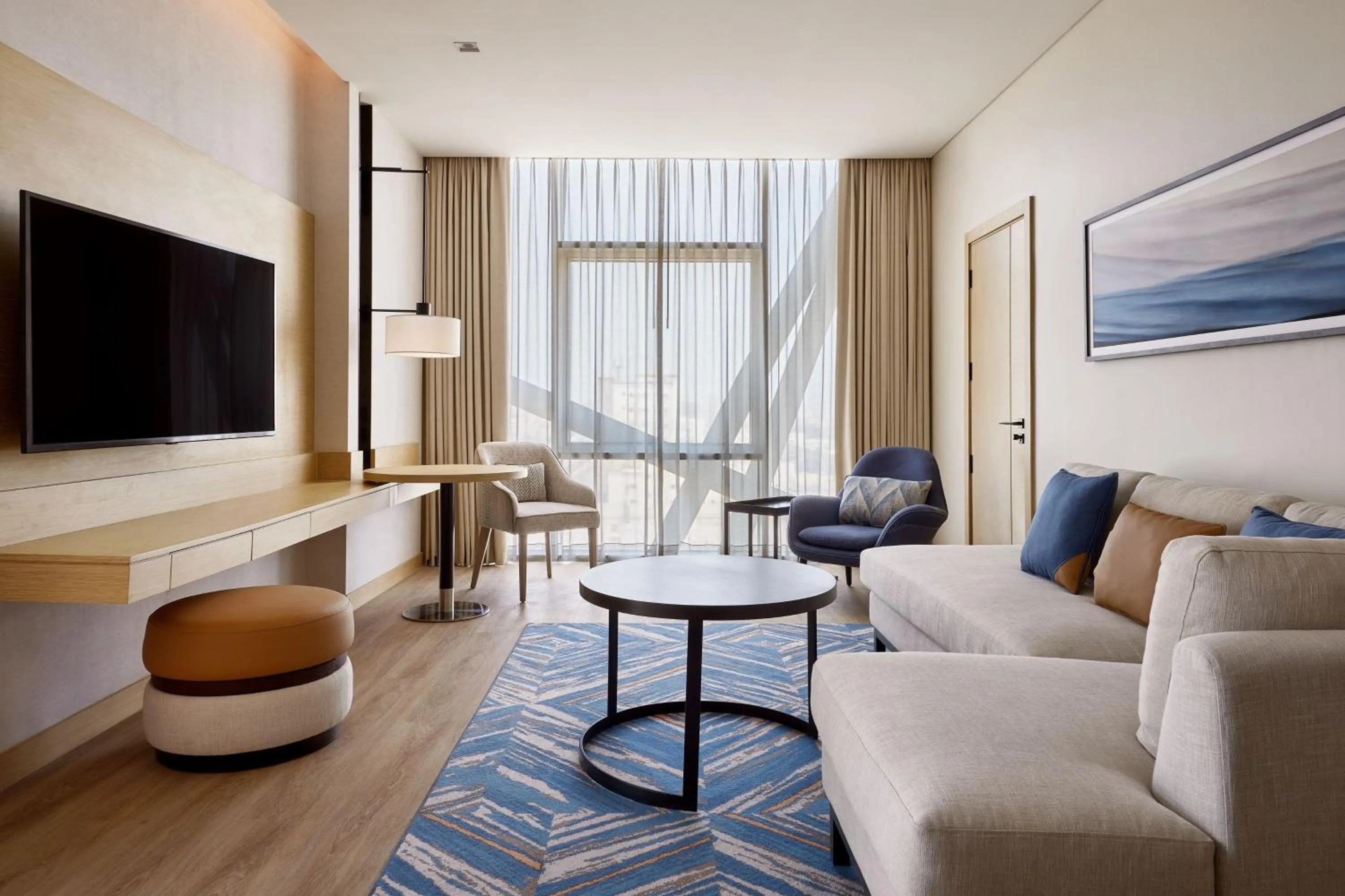 Living room in Courtyard by Marriott Jubail
