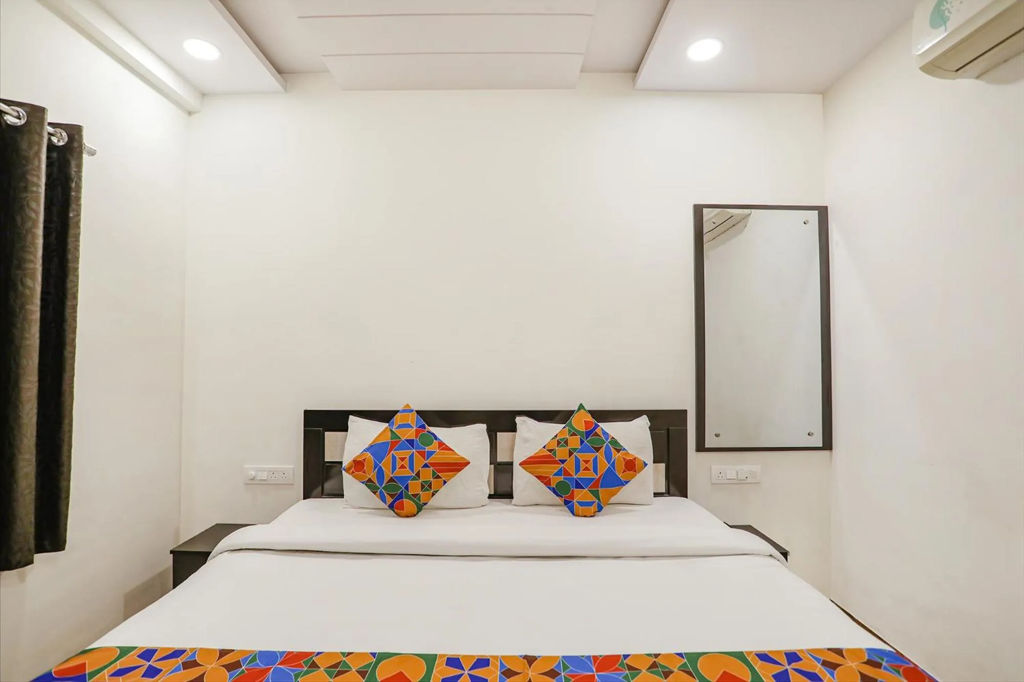 Bed in FabHotel Royal Stay - Beltarodi