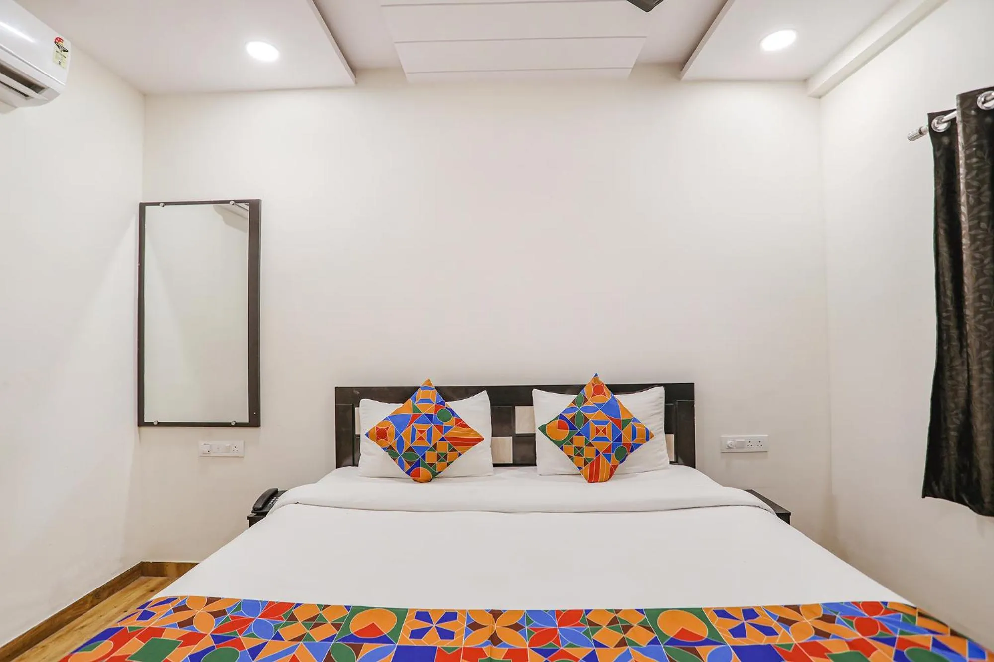 Bed in FabHotel Royal Stay - Beltarodi