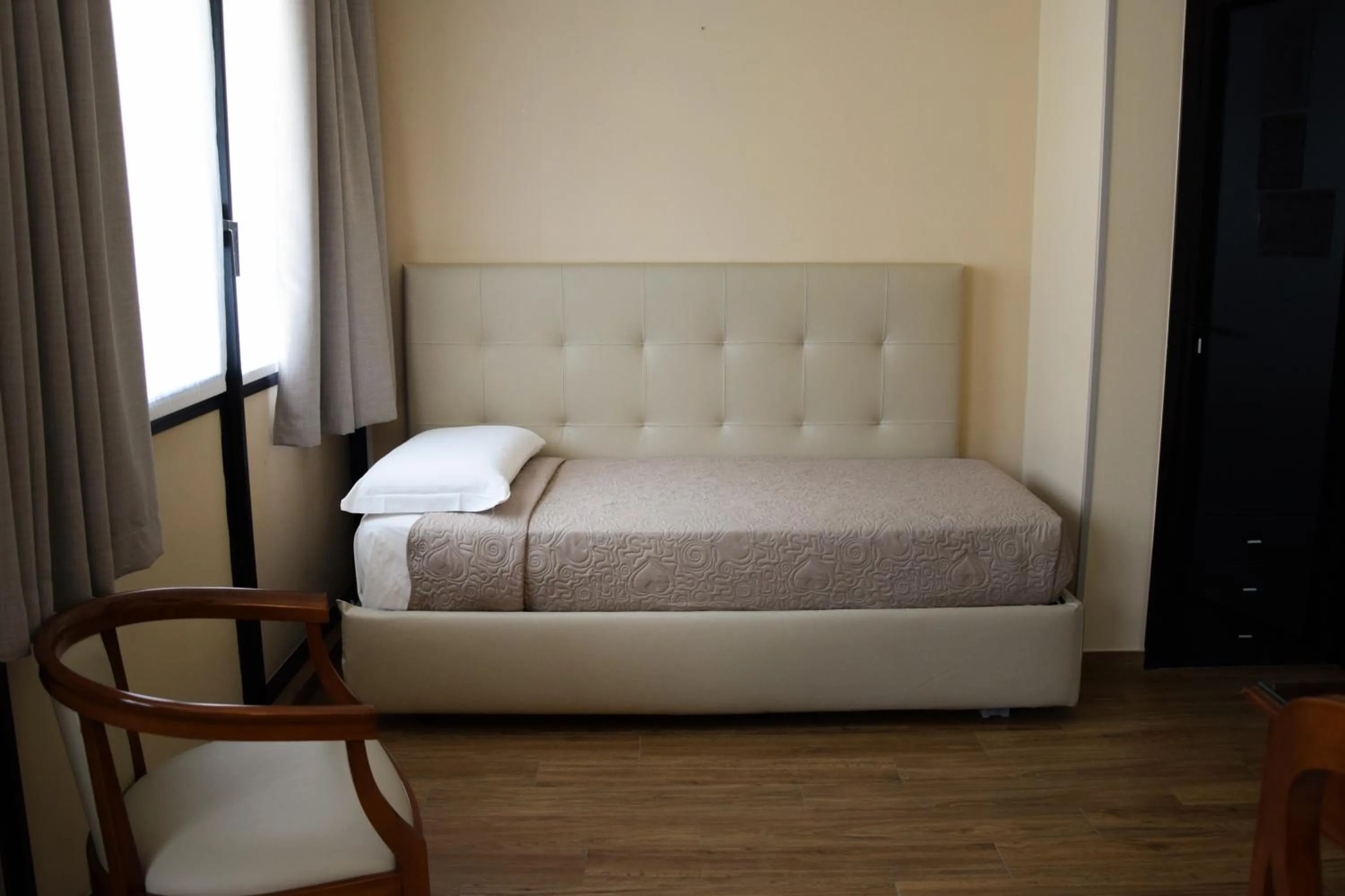 Bed in Hotel Valentino Du Parc