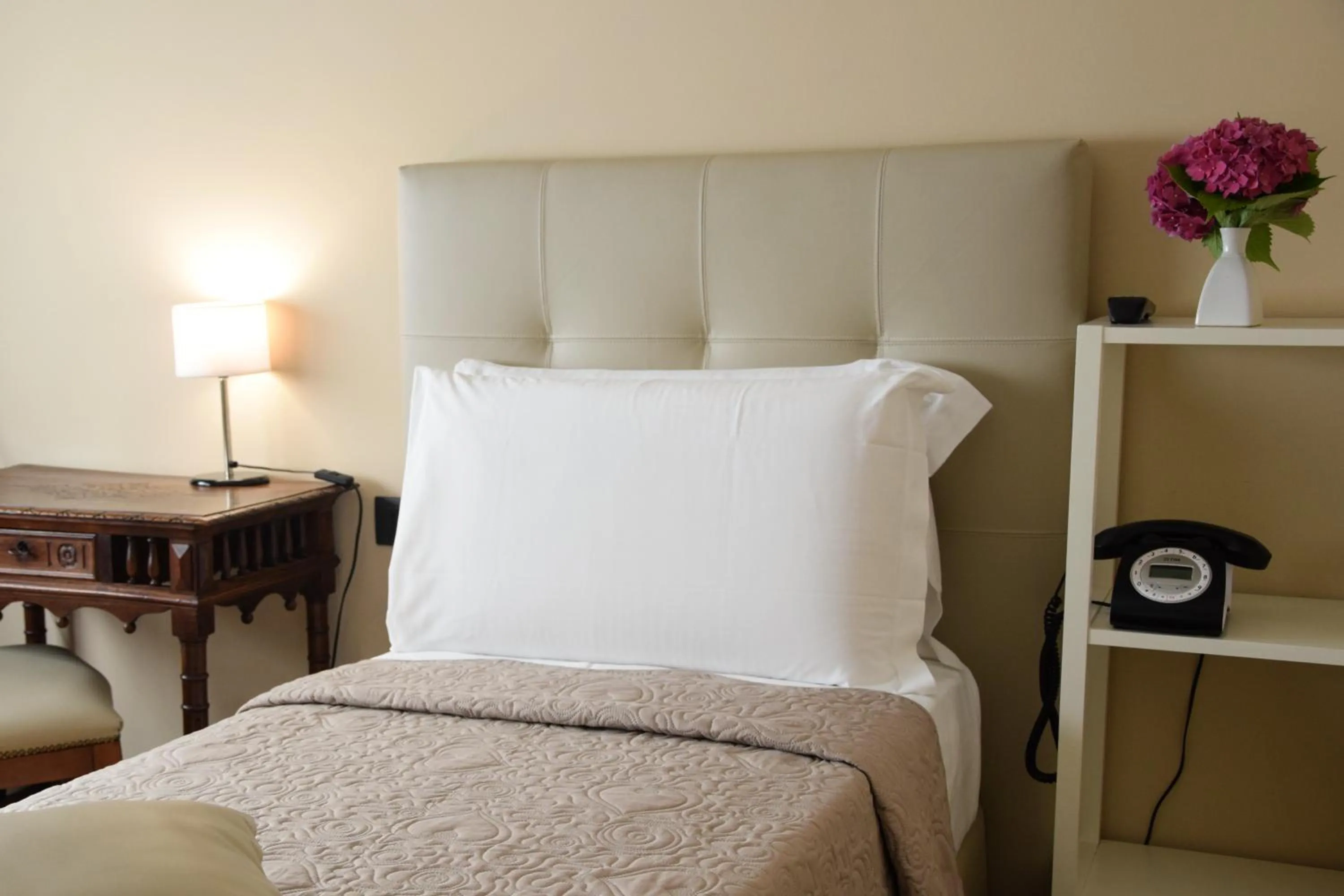 Bed in Hotel Valentino Du Parc