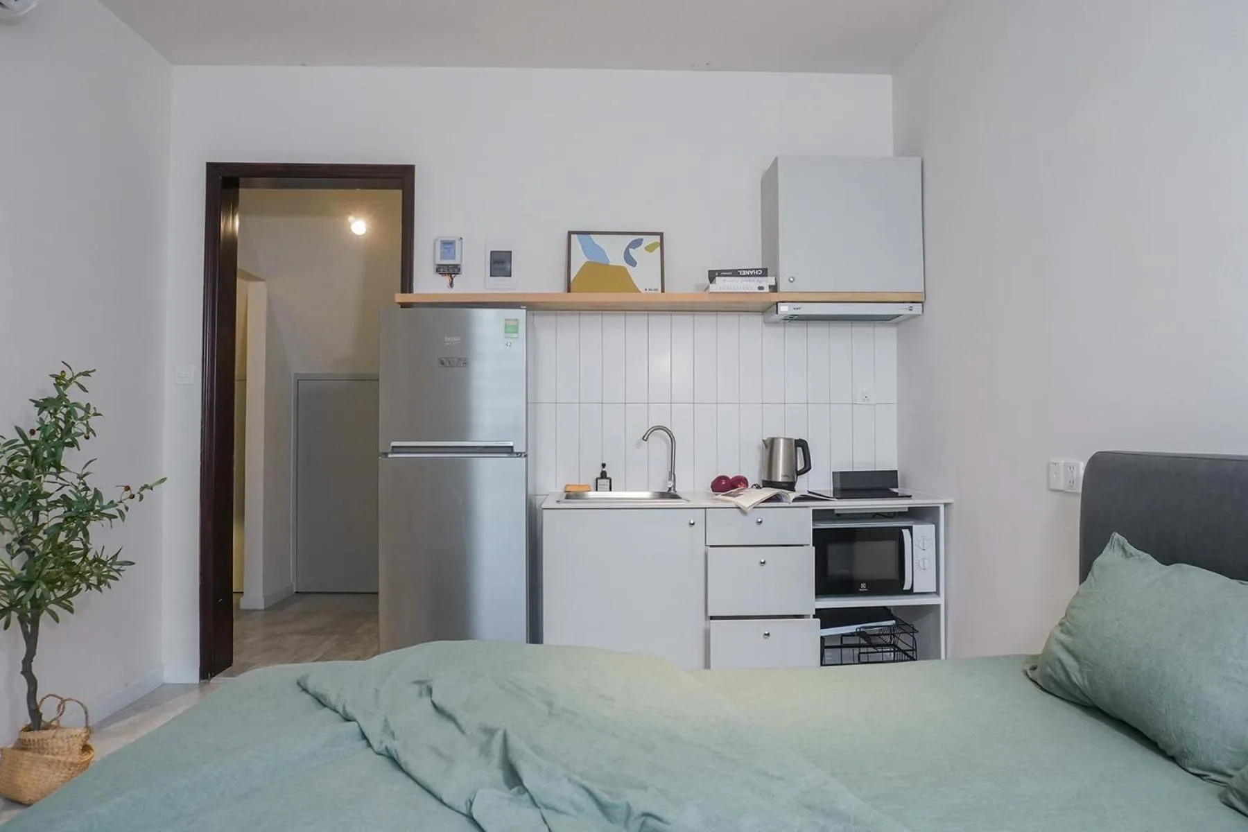 Kitchen or kitchenette, Bed in M Village Living Cửu Long