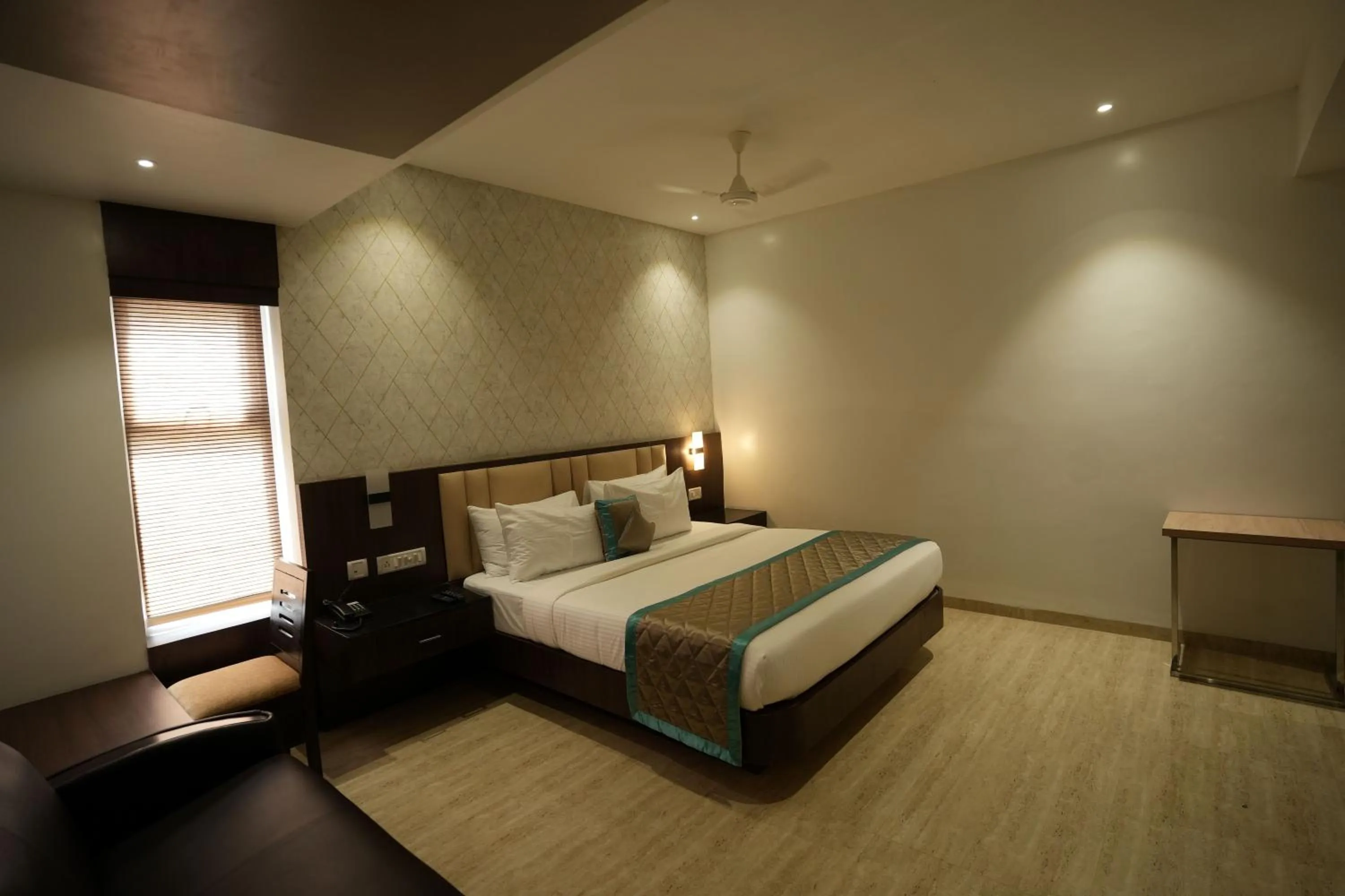 Photo of the whole room, Bed in Sri Ambal Grand