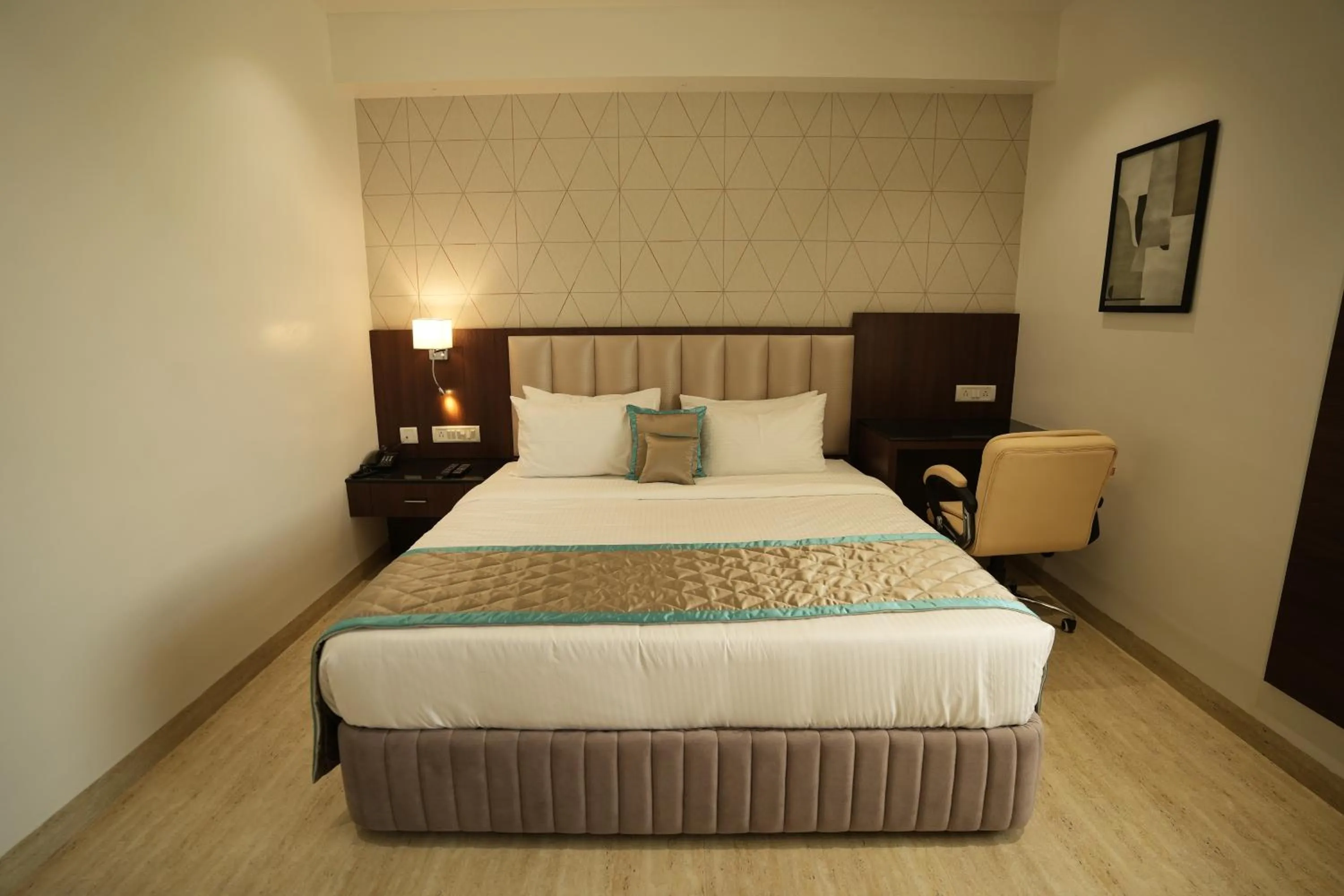 Photo of the whole room, Bed in Sri Ambal Grand