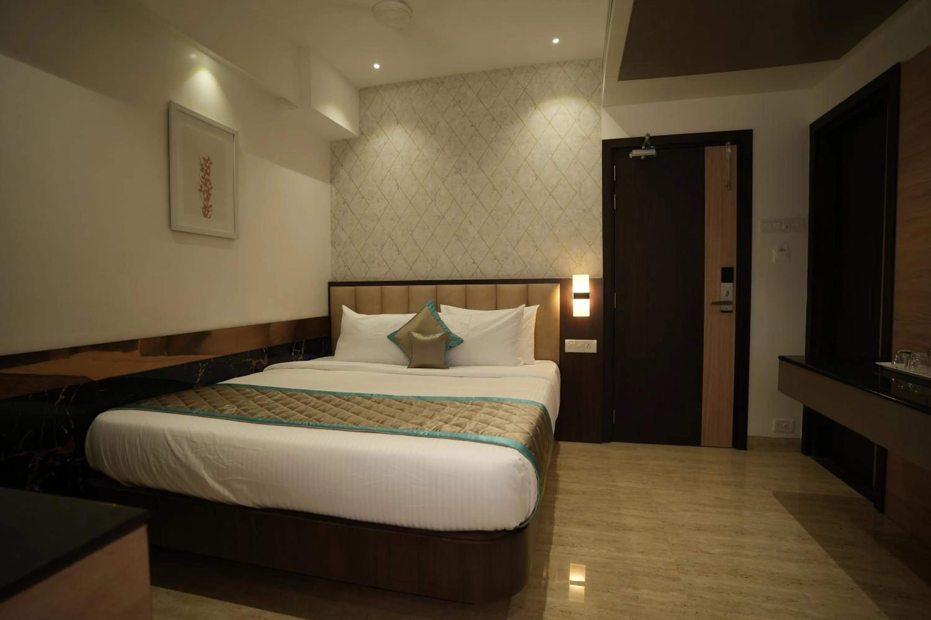 Photo of the whole room, Bed in Sri Ambal Grand