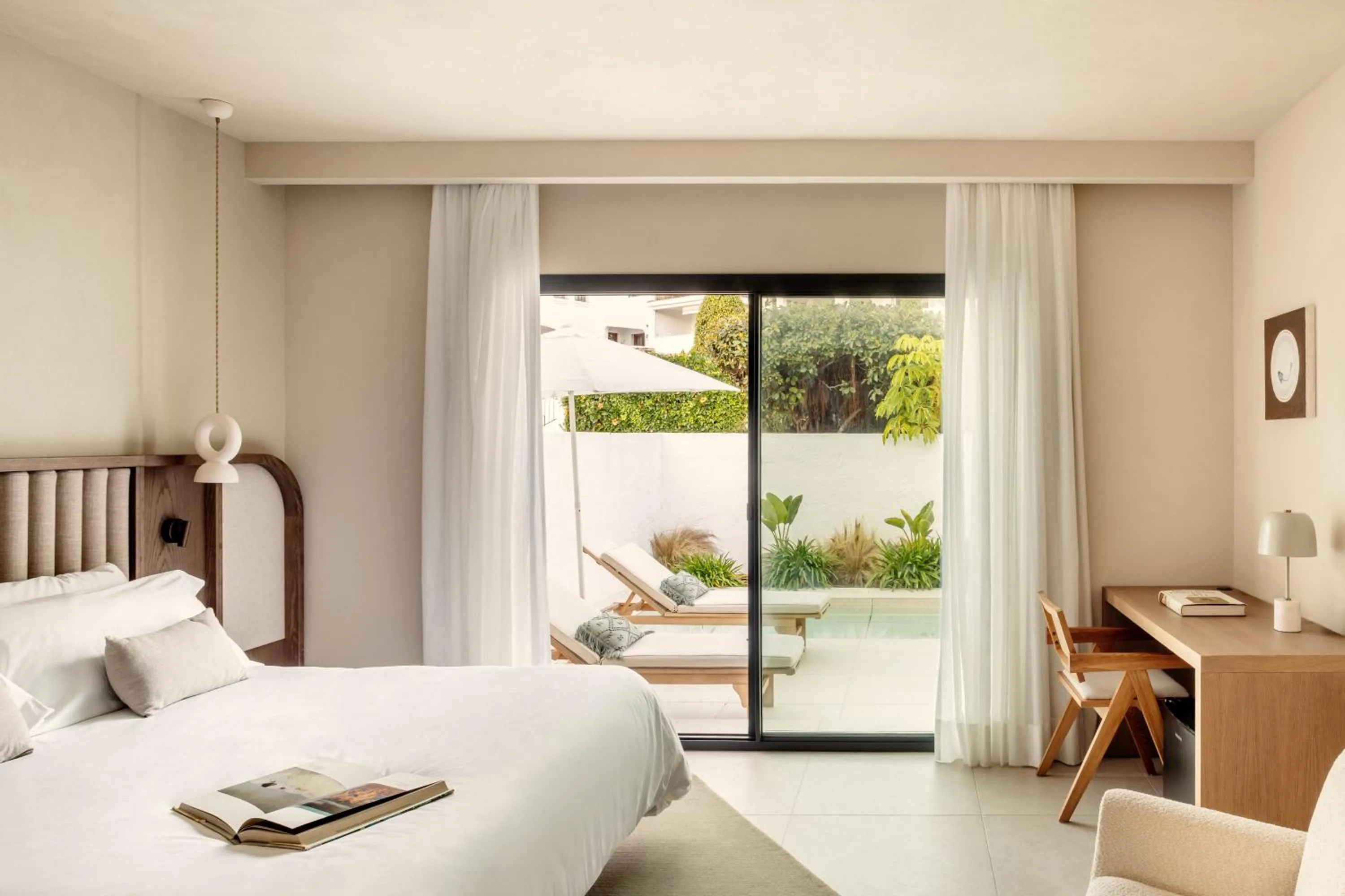 Bed in Anfitrión Villas & Suites