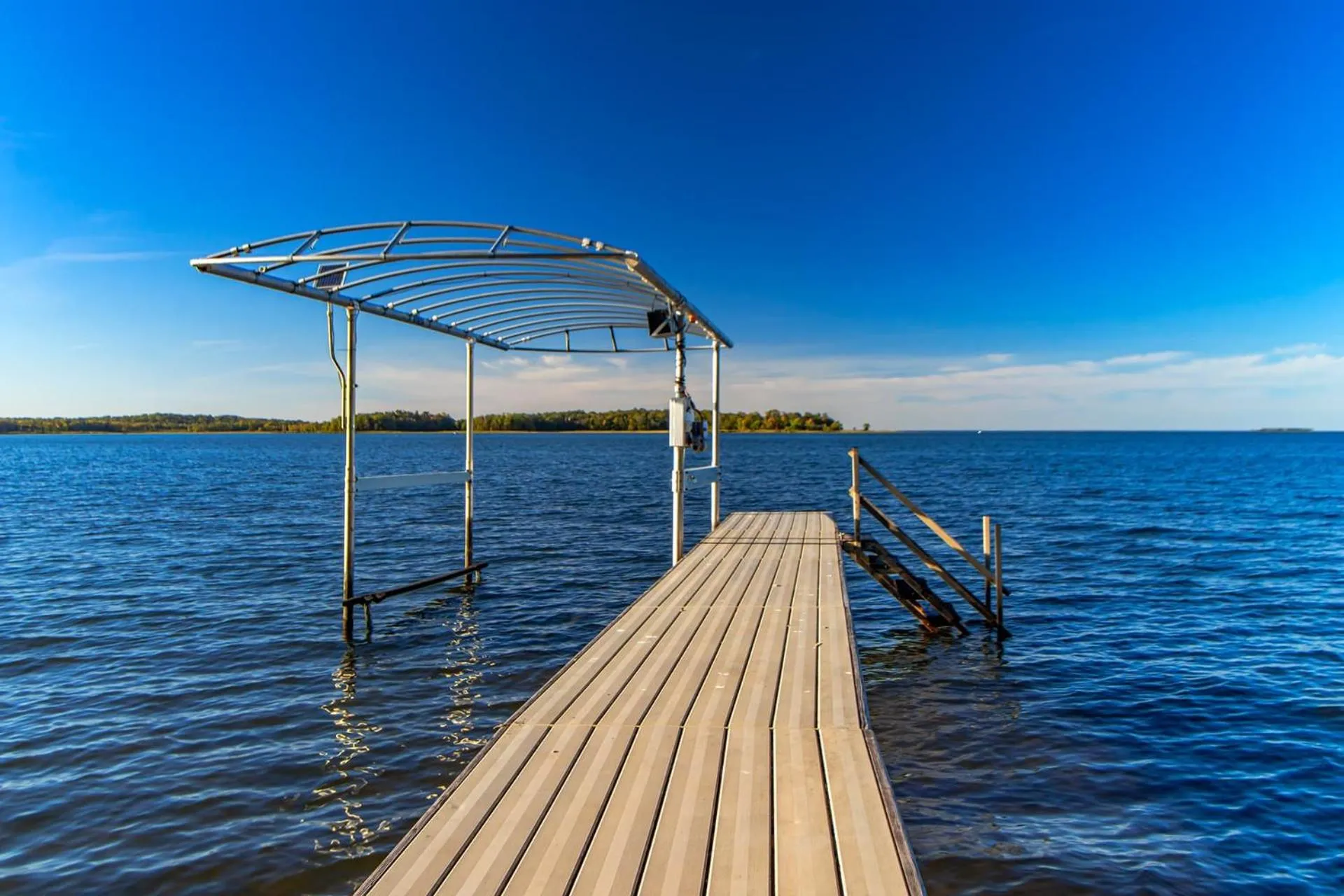 Spacious Leech Lake Home on 2 Private Acres, 200' of lake shore 15 Minutes to Walker with boat lift, dock, swimming, fire pit