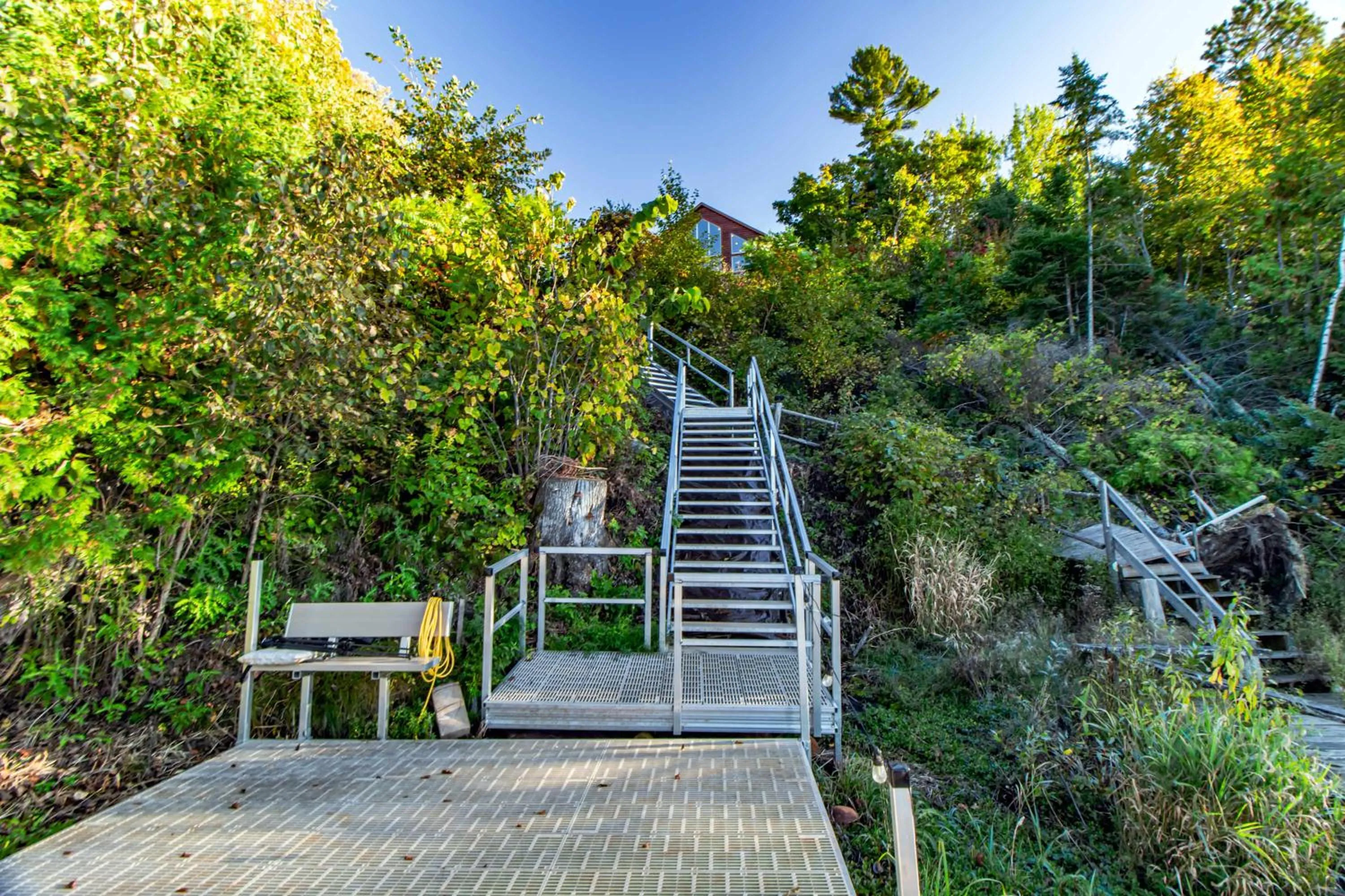 Spacious Leech Lake Home on 2 Private Acres, 200' of lake shore 15 Minutes to Walker with boat lift, dock, swimming, fire pit