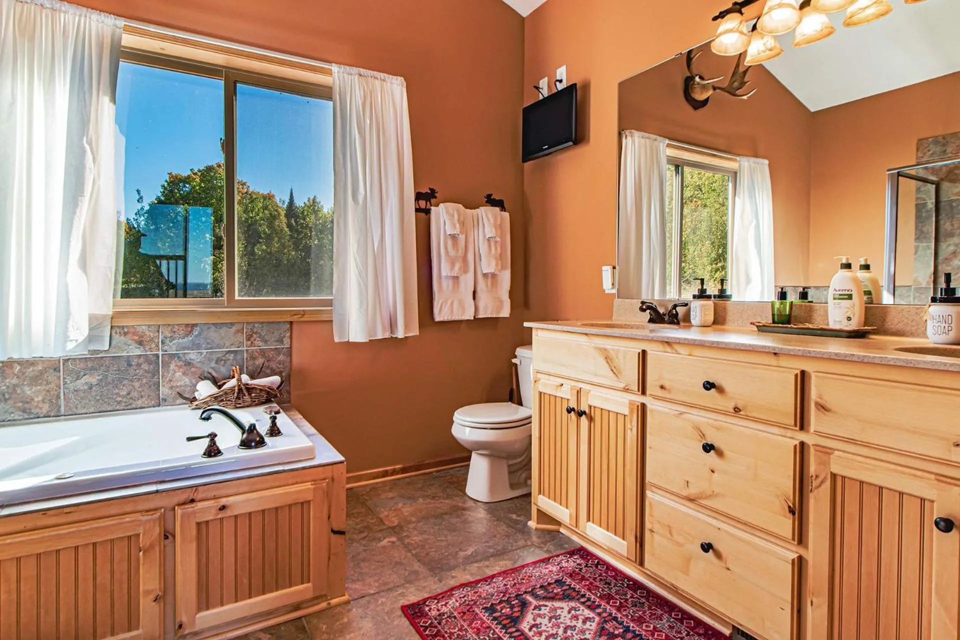 Spacious Leech Lake Home on 2 Private Acres, 200' of lake shore 15 Minutes to Walker with boat lift, dock, swimming, fire pit