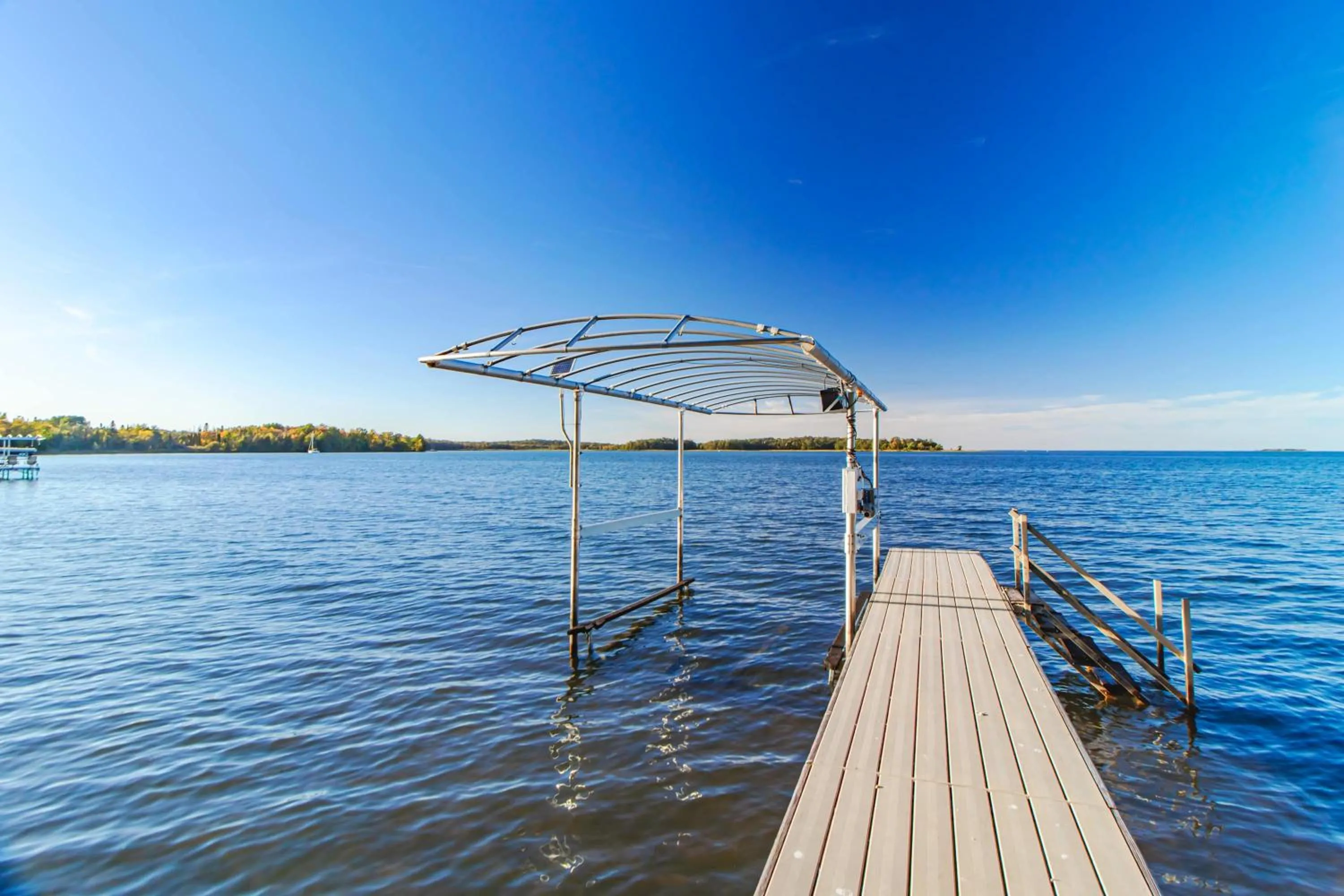 Spacious Leech Lake Home on 2 Private Acres, 200' of lake shore 15 Minutes to Walker with boat lift, dock, swimming, fire pit