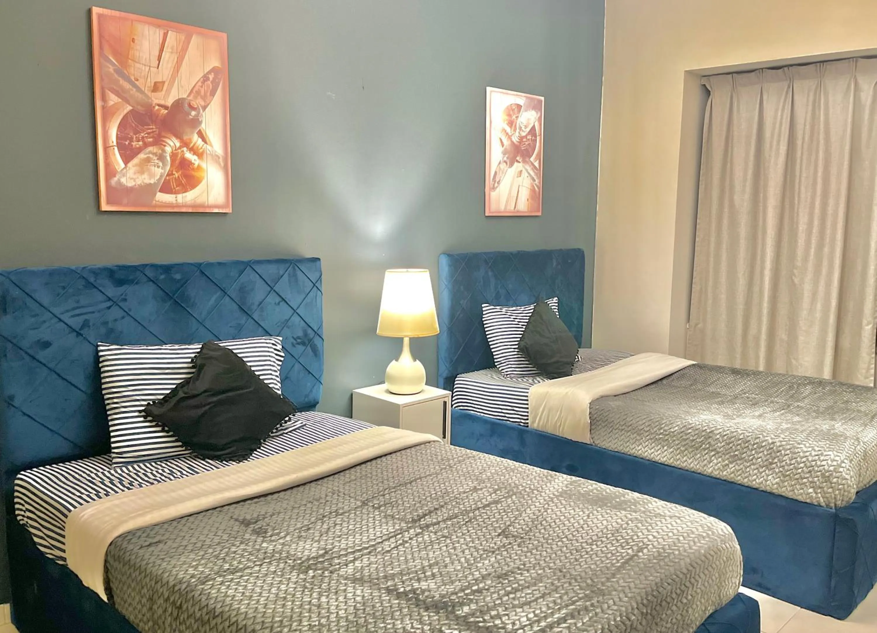 Bed in Chic 3 bedroom apartment