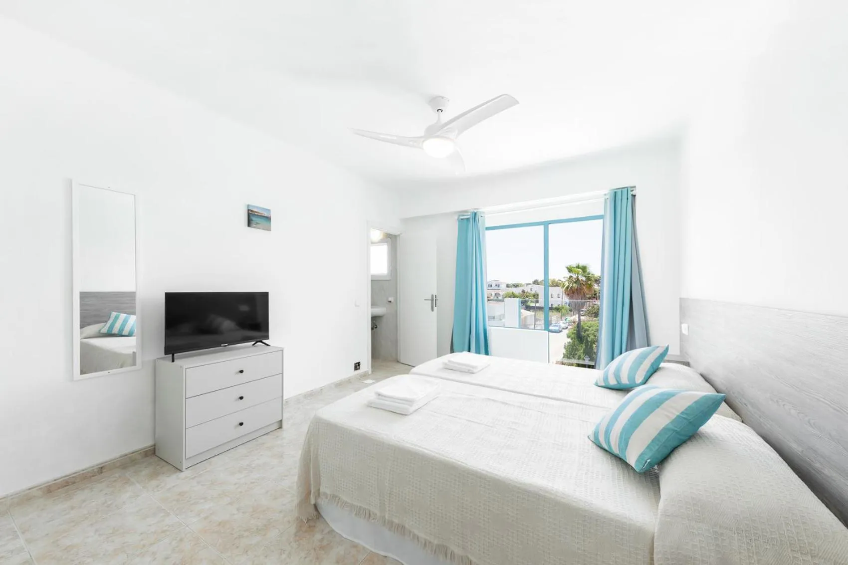 Bed in Hostal Cala Llombards