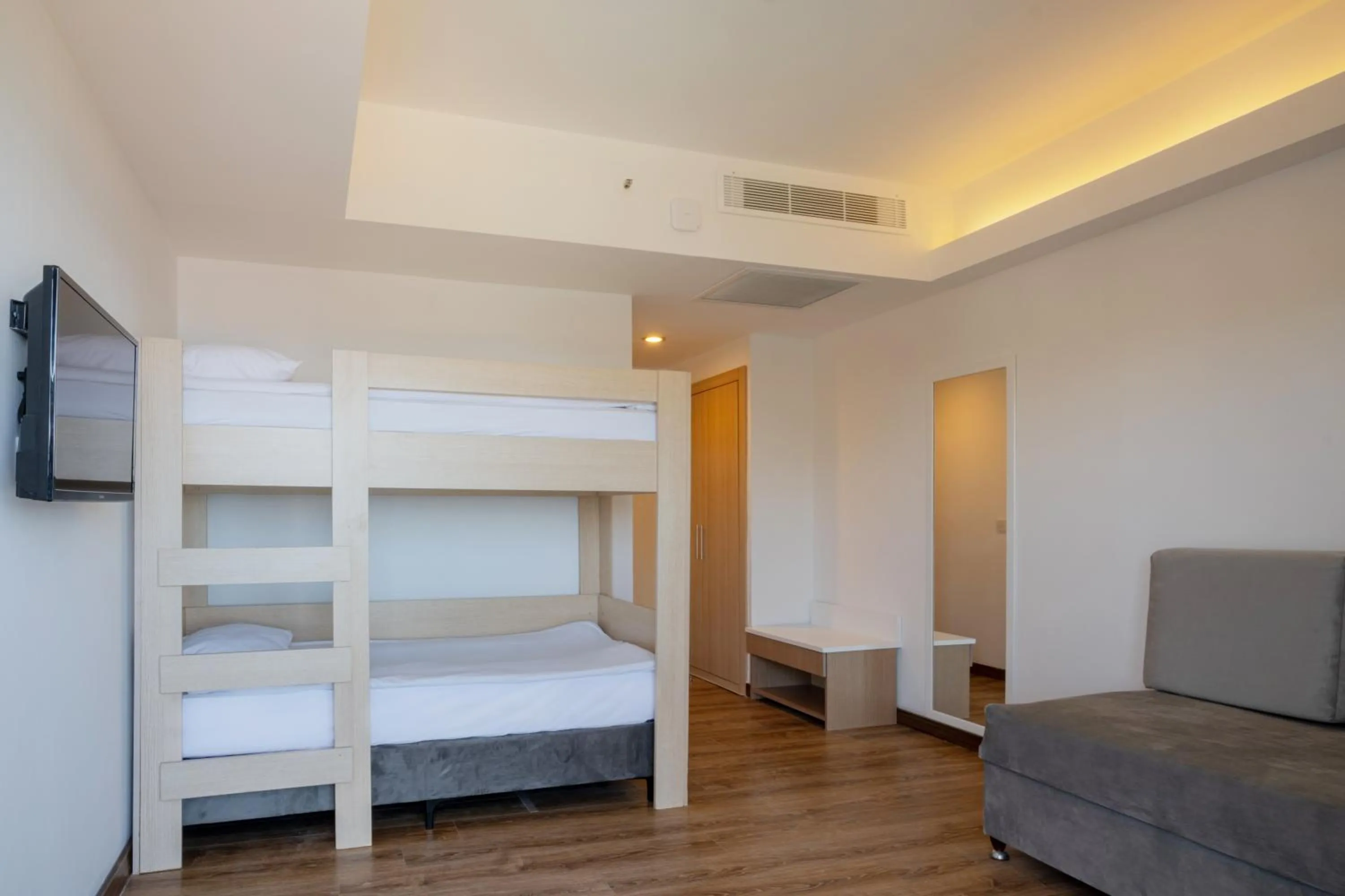 Bed in FORE RESORT & SPA