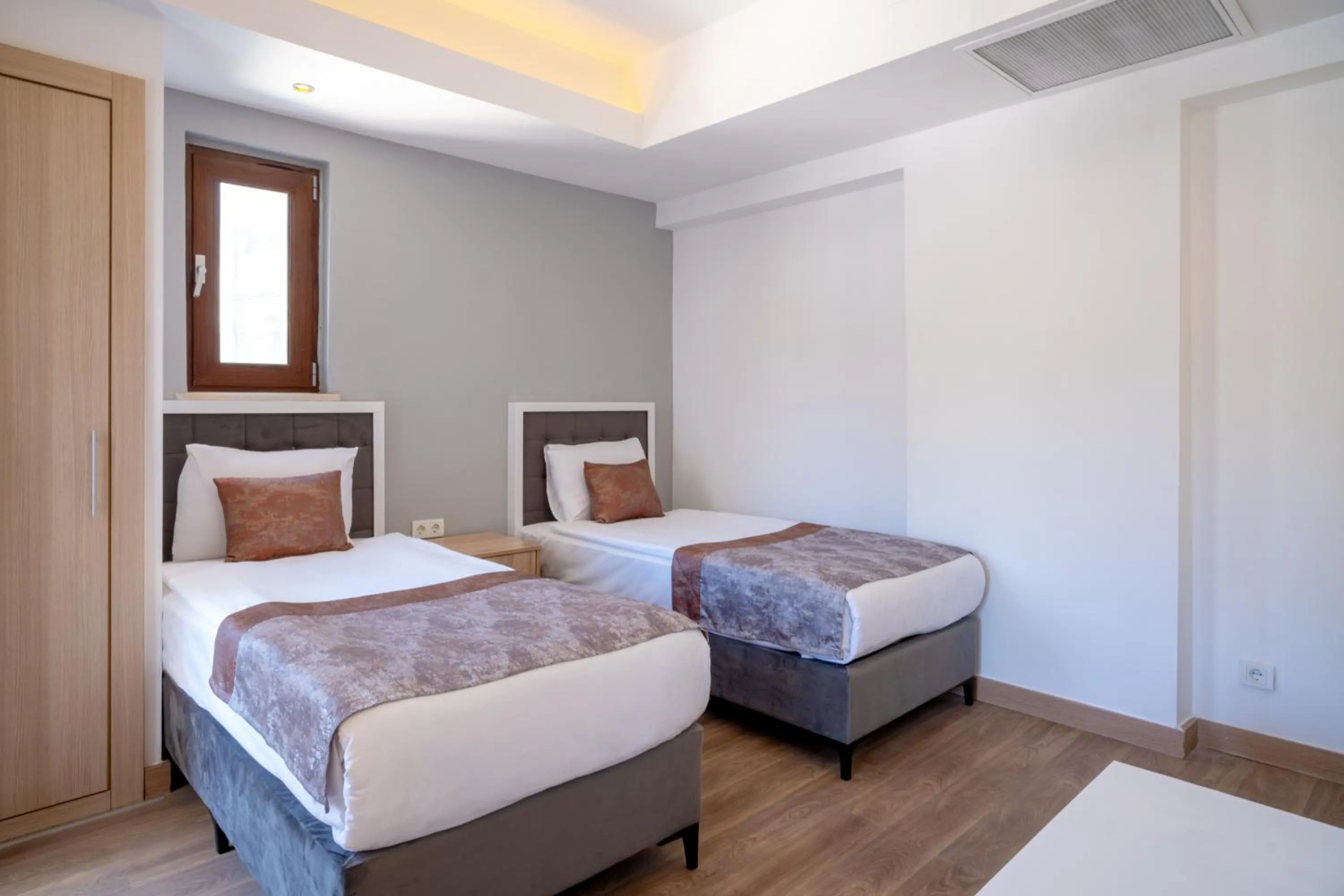 Bed in FORE RESORT & SPA