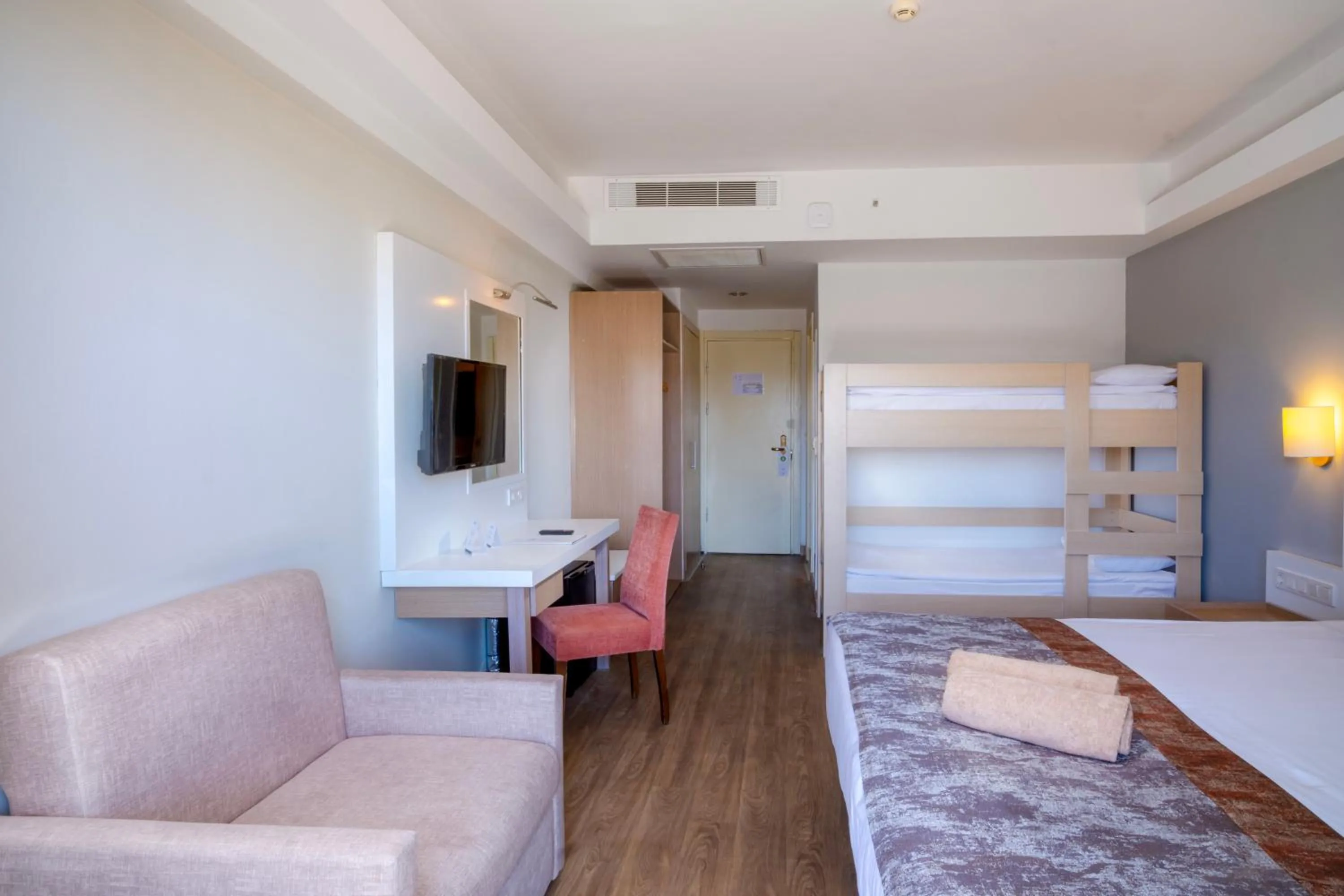 Bed in FORE RESORT & SPA