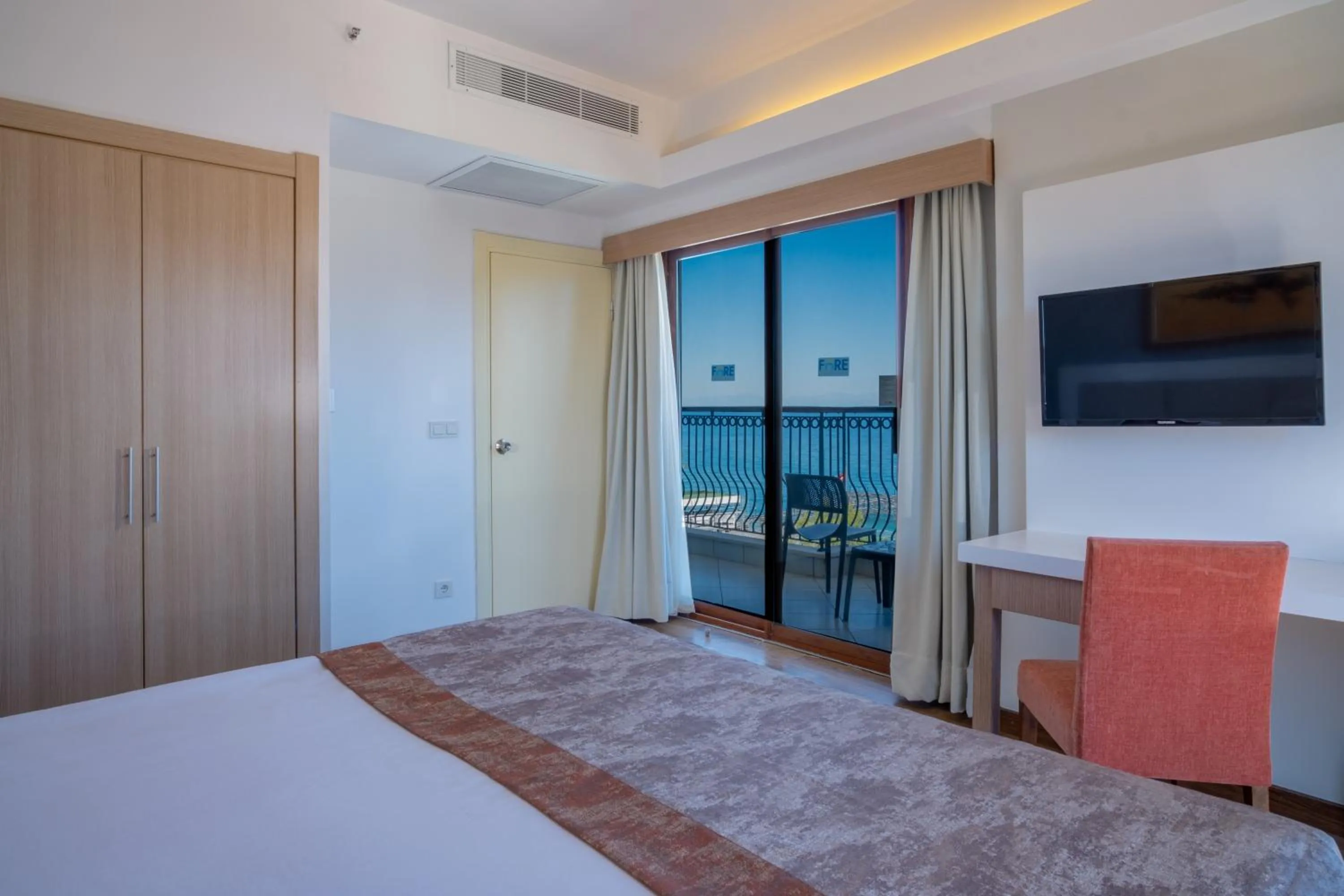 Bed in FORE RESORT & SPA