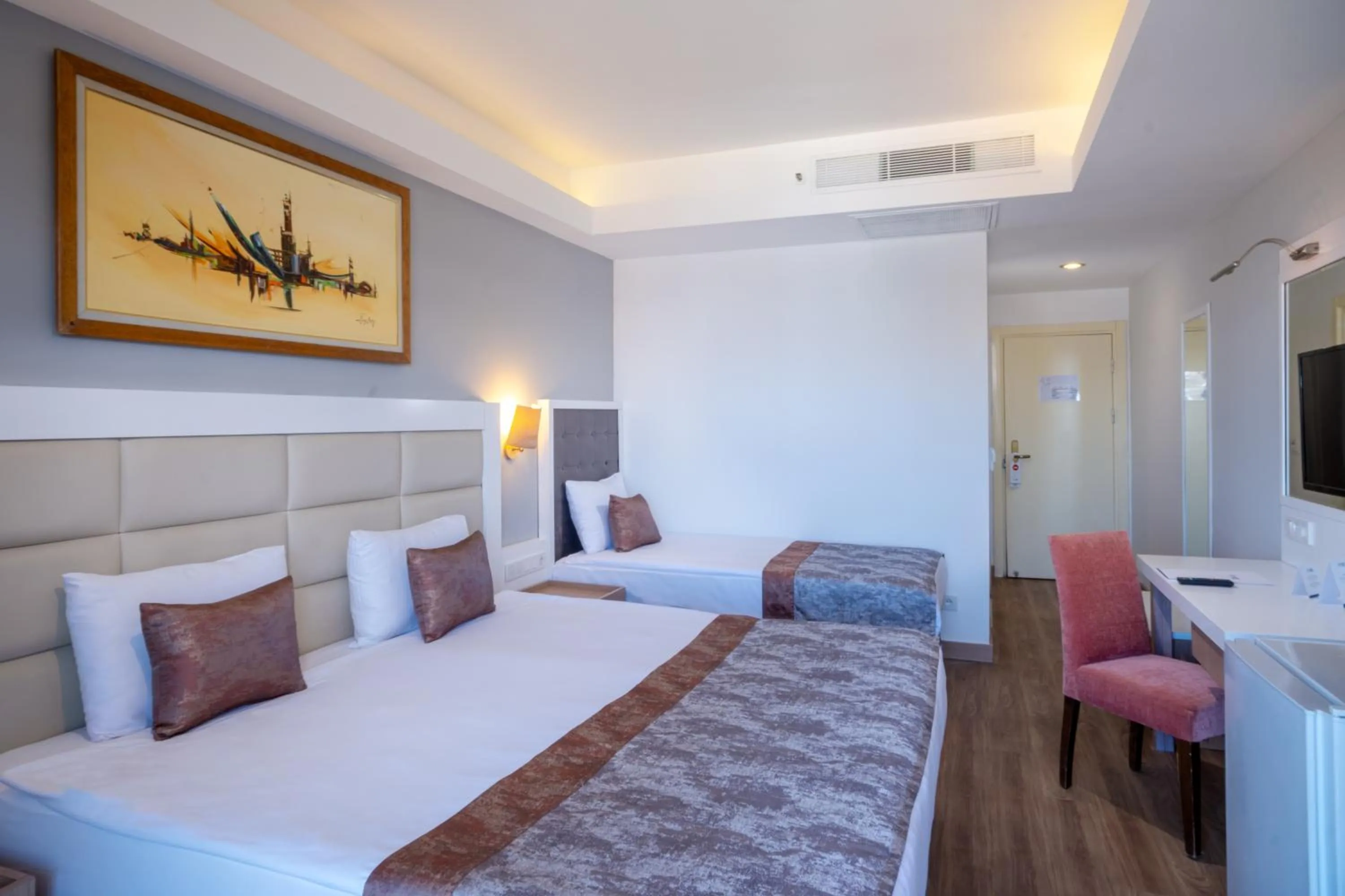 Bed in FORE RESORT & SPA