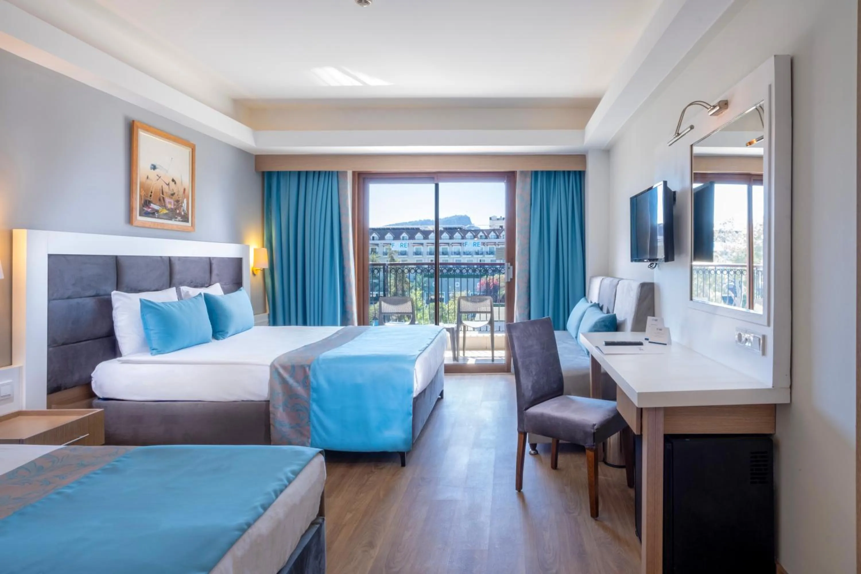 Bed in FORE RESORT & SPA