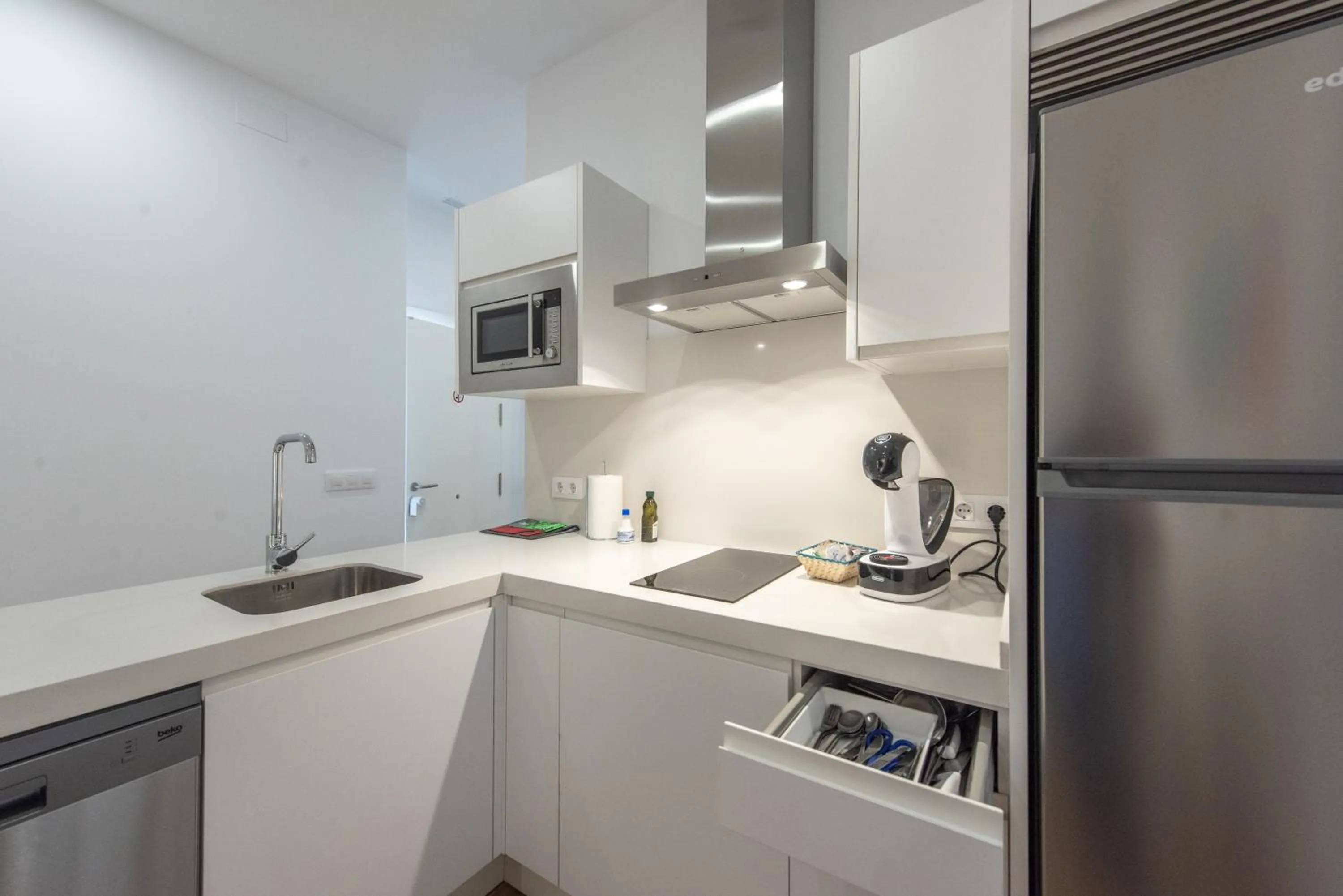 Kitchen or kitchenette in Apartamentos Santa María 15