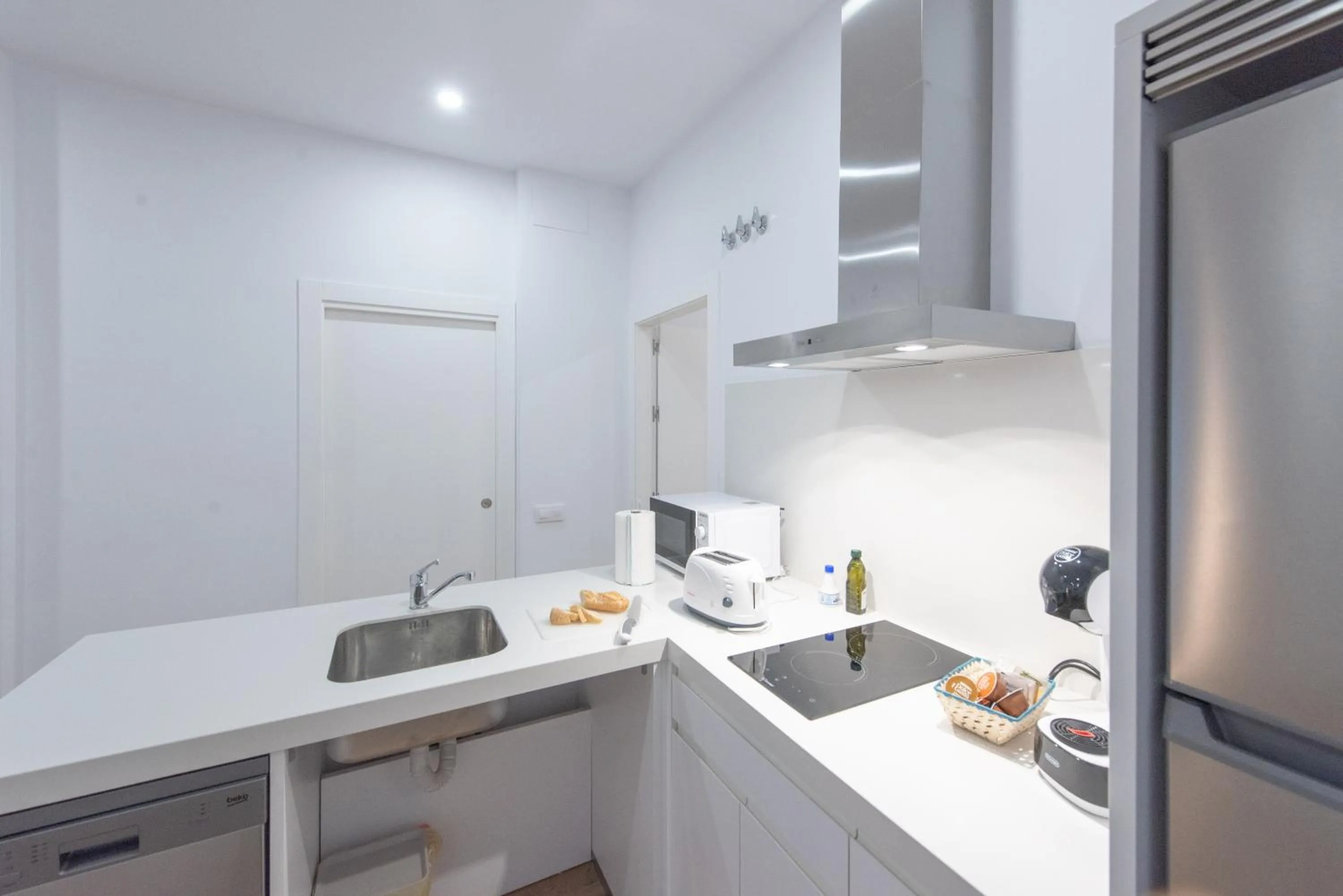 Kitchen or kitchenette in Apartamentos Santa María 15