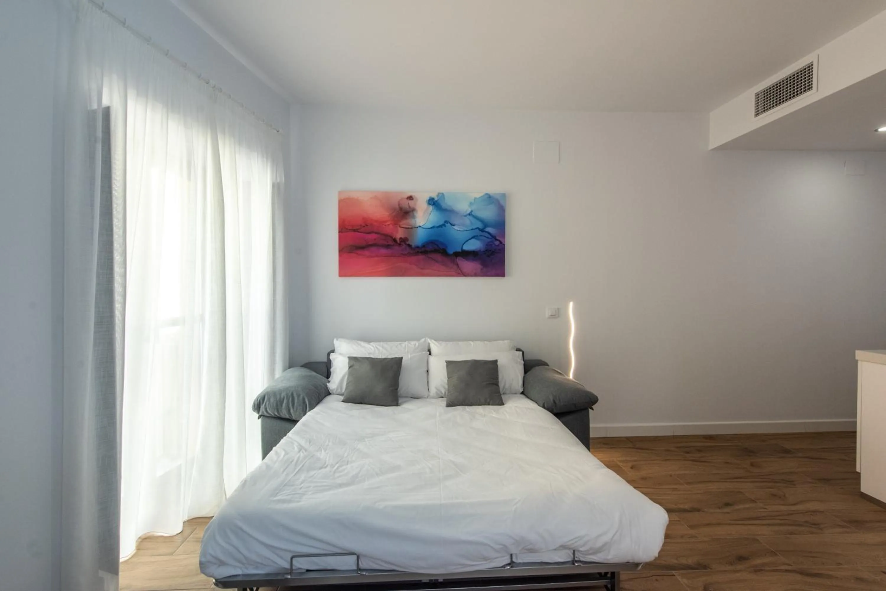 Living room, Bed in Apartamentos Santa María 15