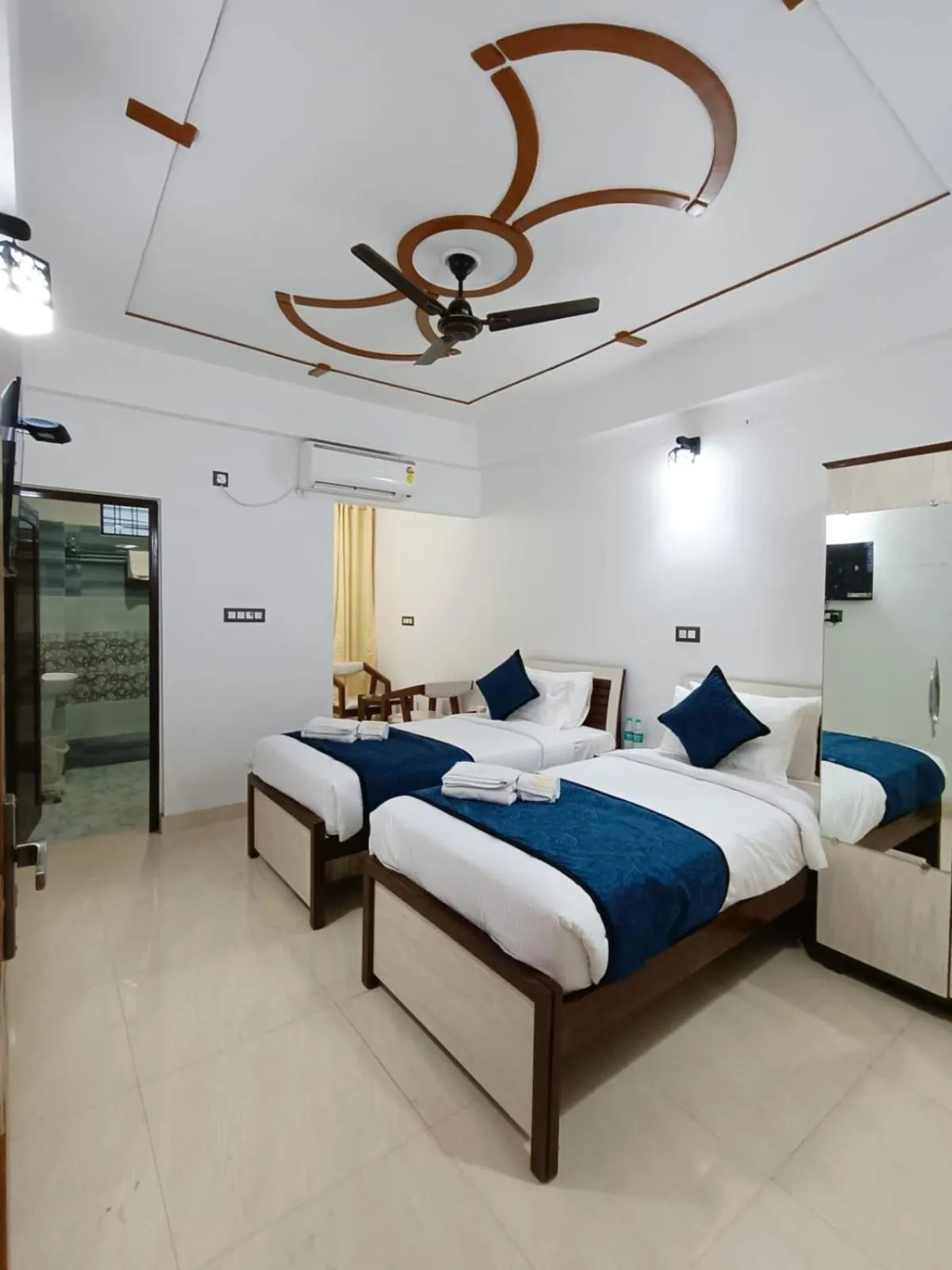 Bed in Hotel Aman Residency