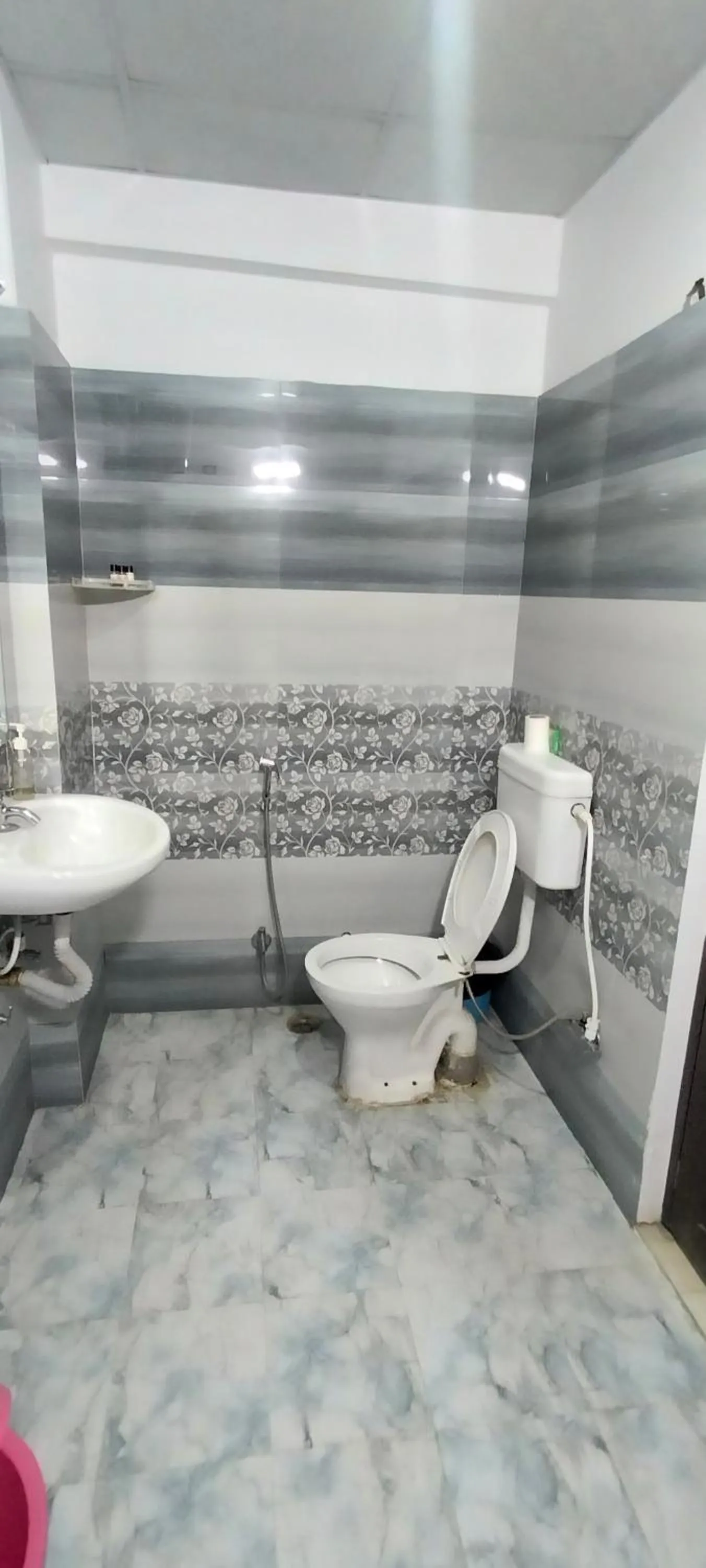 Toilet in Hotel Aman Residency