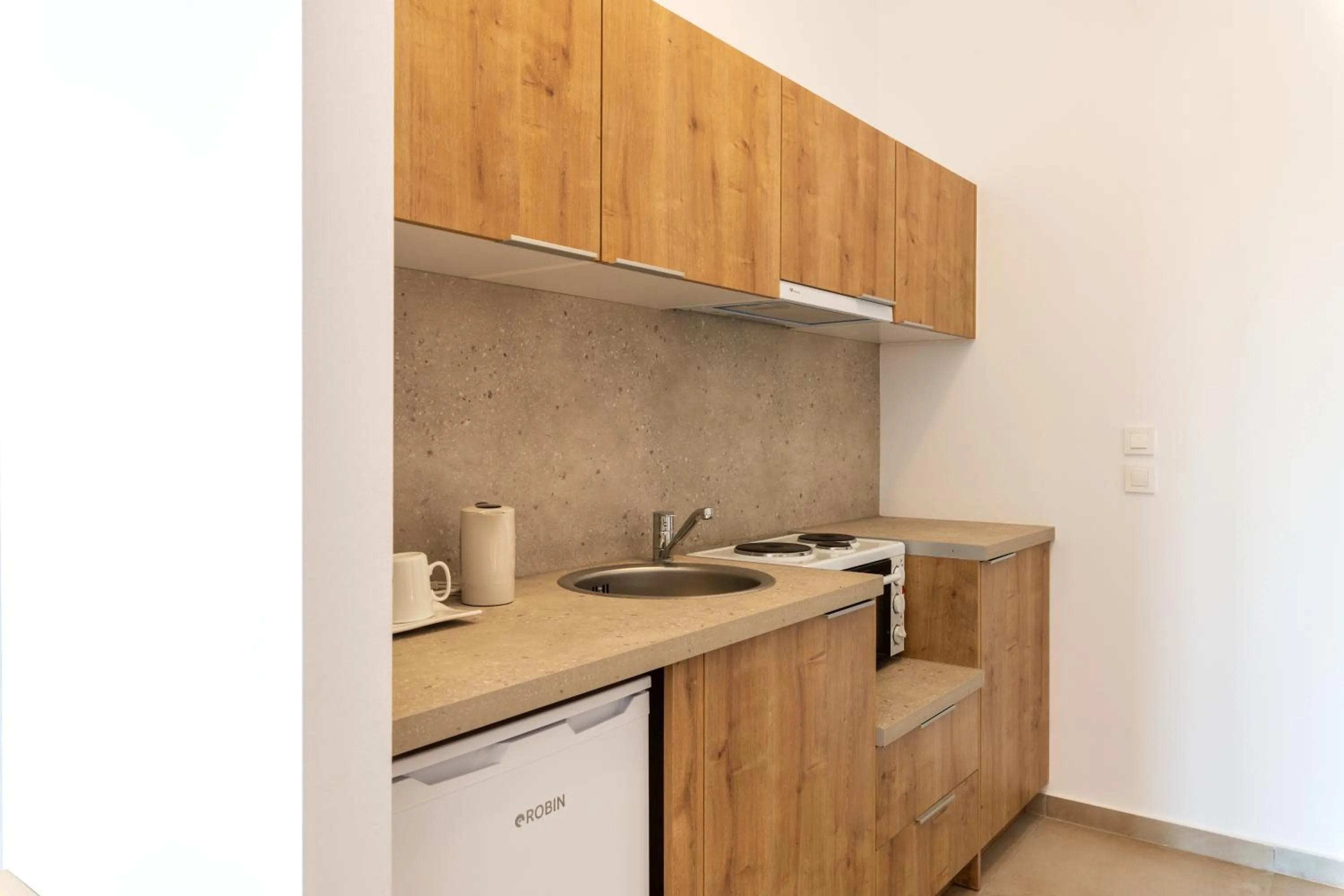 Kitchen or kitchenette in Mykonaki Hotel