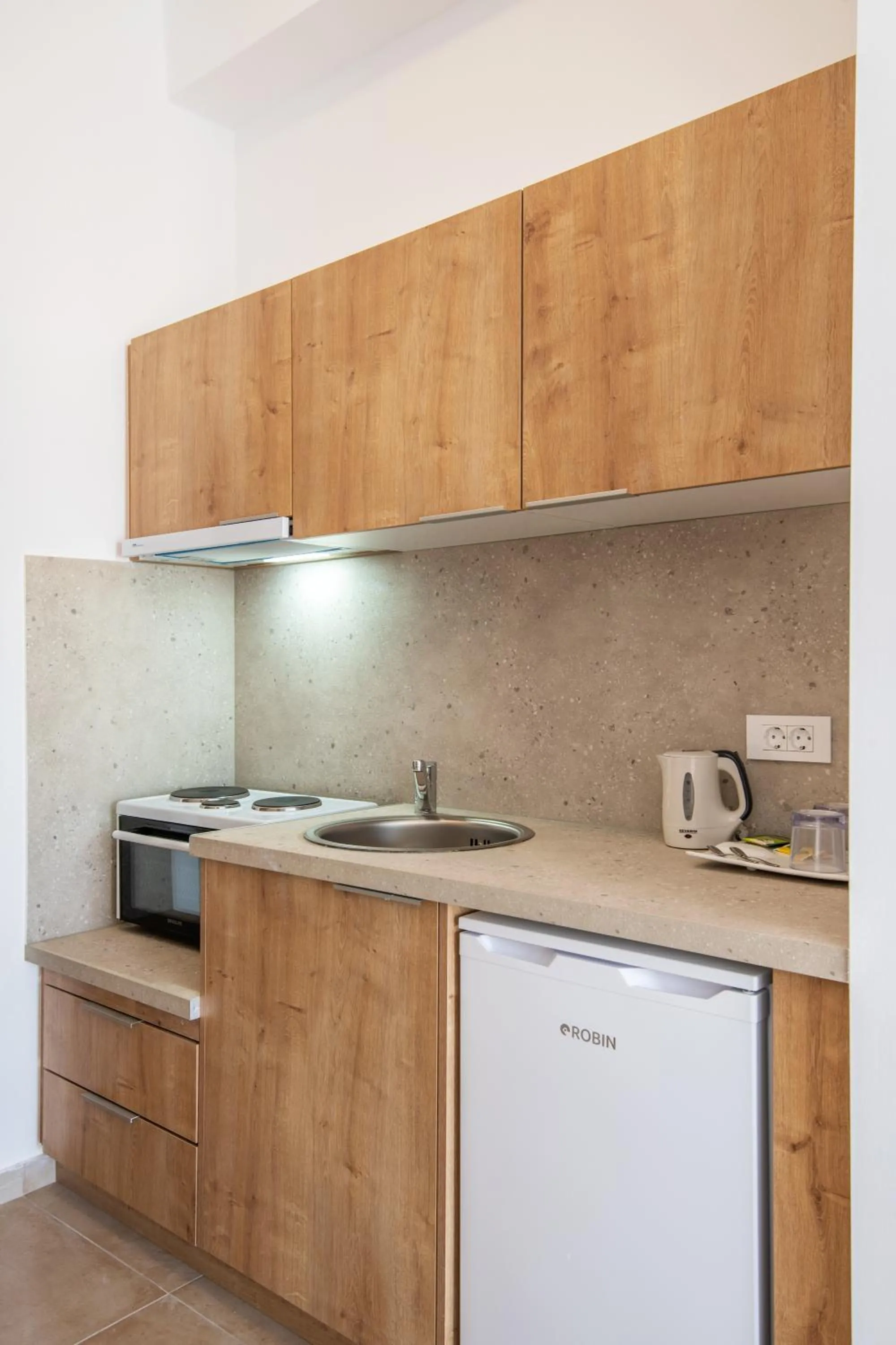 Kitchen or kitchenette in Mykonaki Hotel