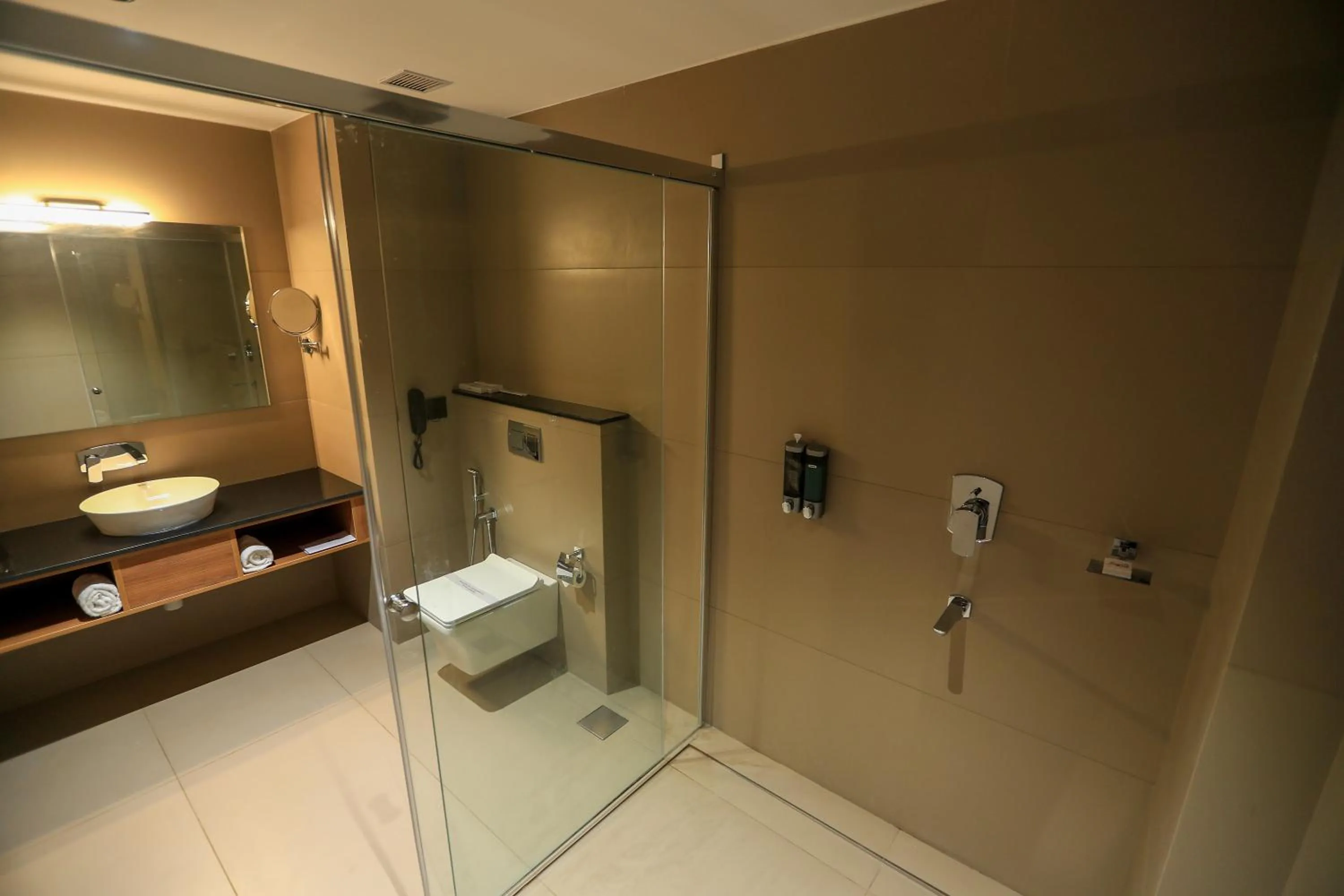 Shower in Hotel Saffron Wayanad