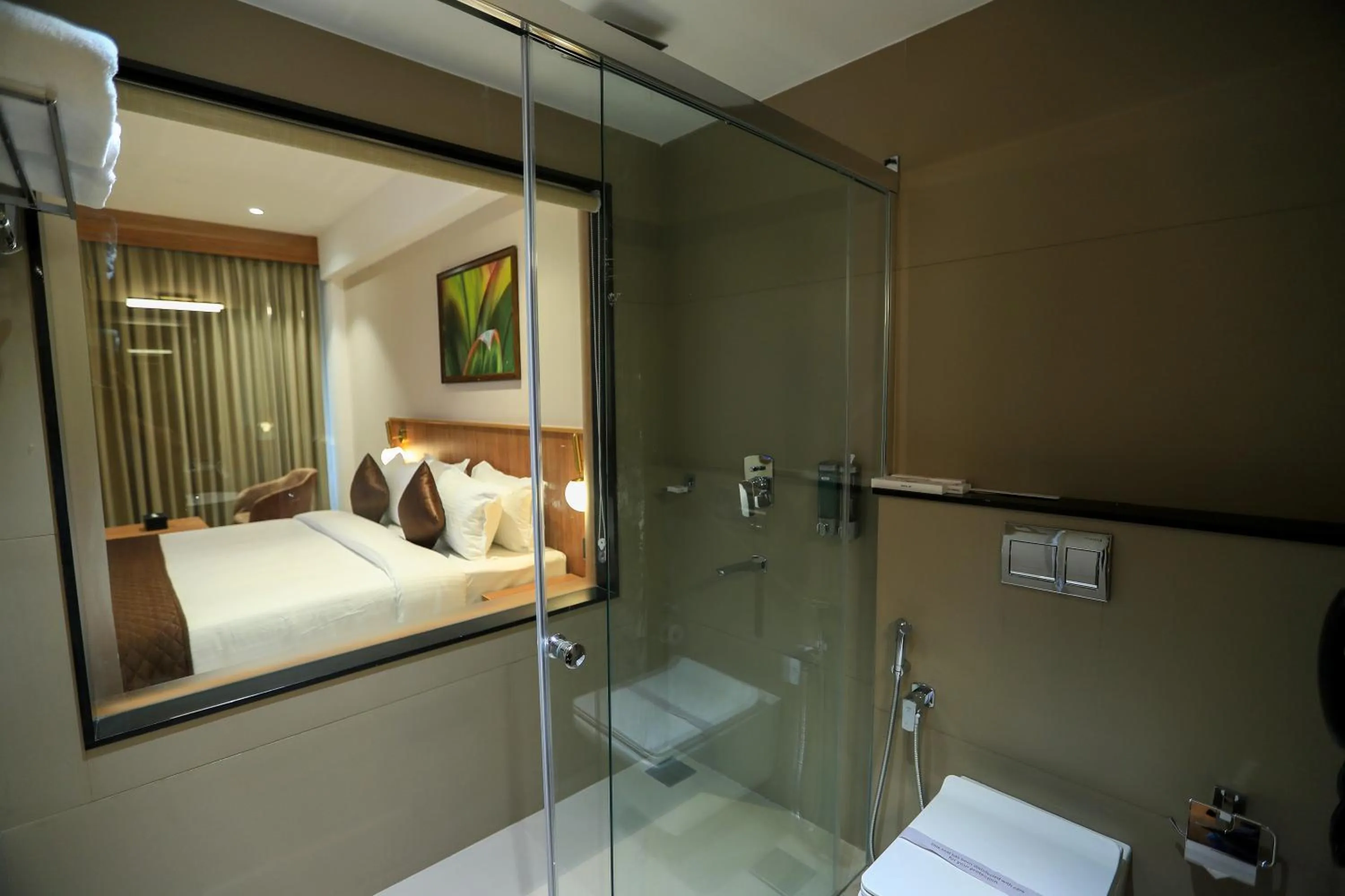 Bathroom, Bed in Hotel Saffron Wayanad
