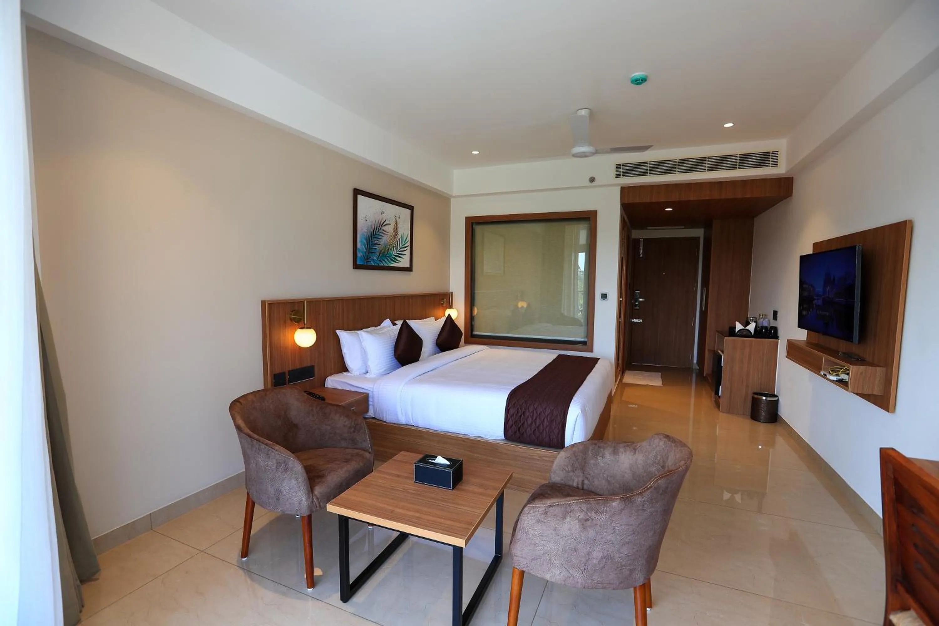 Bedroom, Bed in Hotel Saffron Wayanad