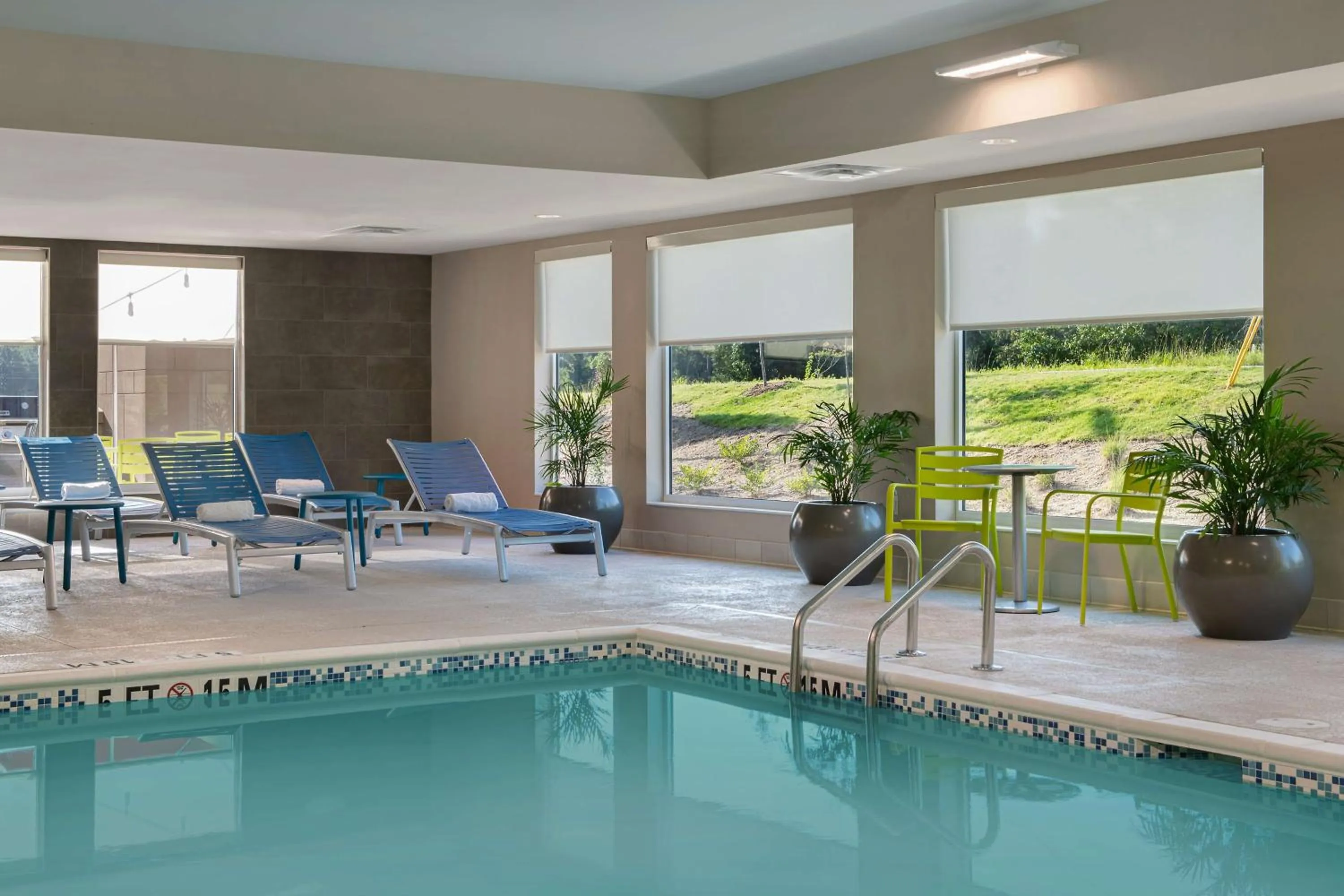 Pool view in Home2 Suites By Hilton Fayetteville North