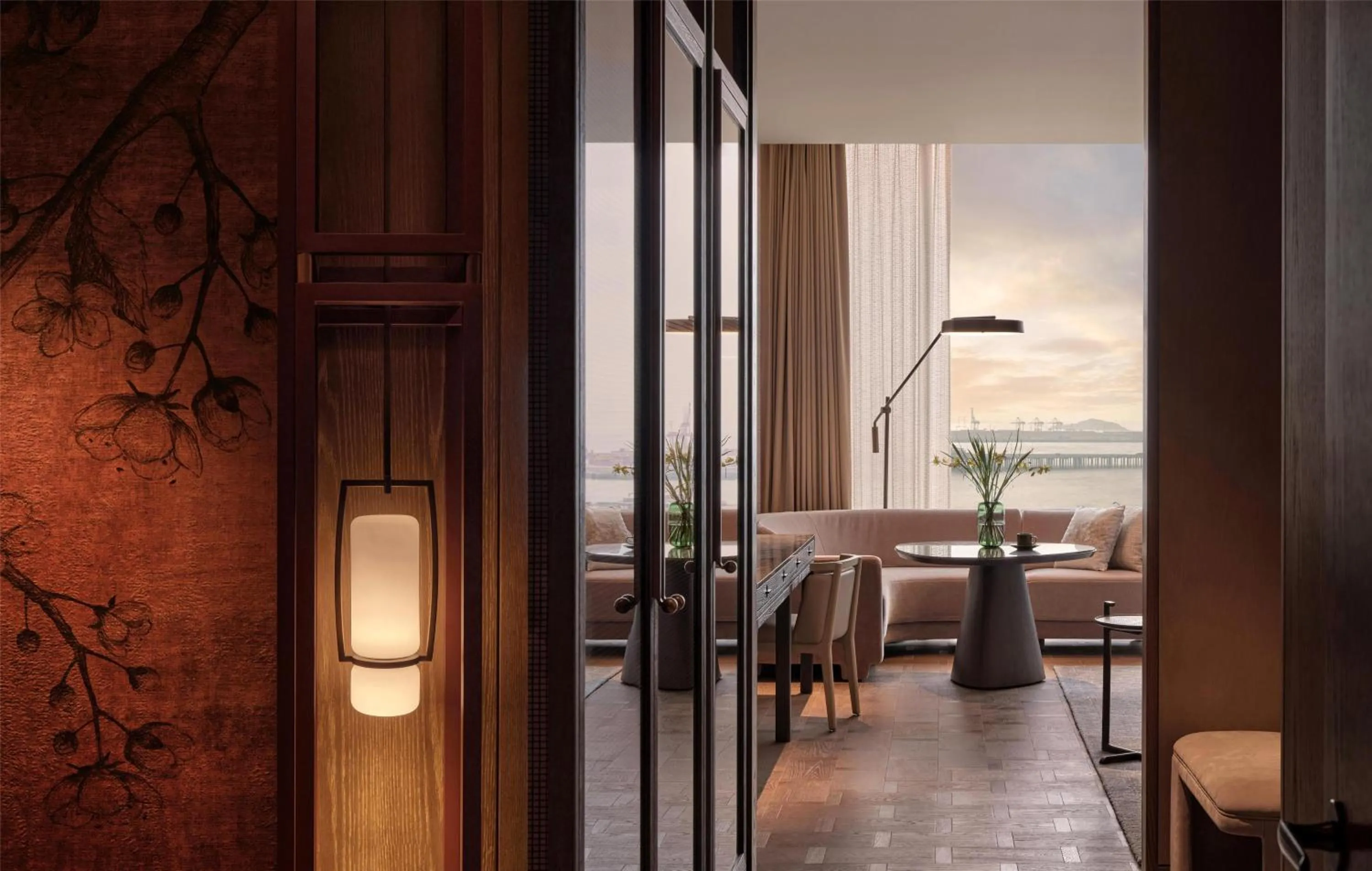 Photo of the whole room in Conrad Shenzhen, the first art museum hotel in Greater Bay Area with the stunning bay and sunset view in the hotel terrace