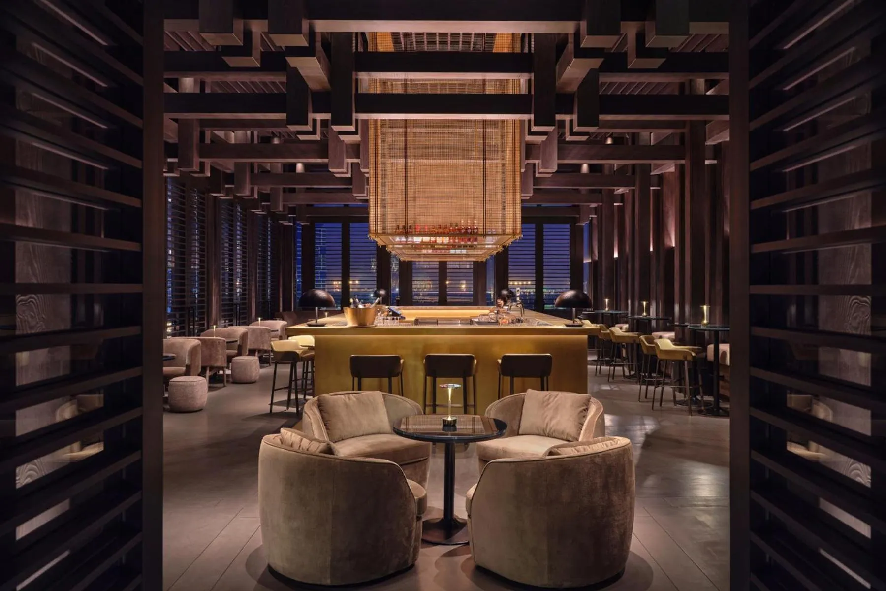 Lounge or bar in Conrad Shenzhen, the first art museum hotel in Greater Bay Area with the stunning bay and sunset view in the hotel terrace