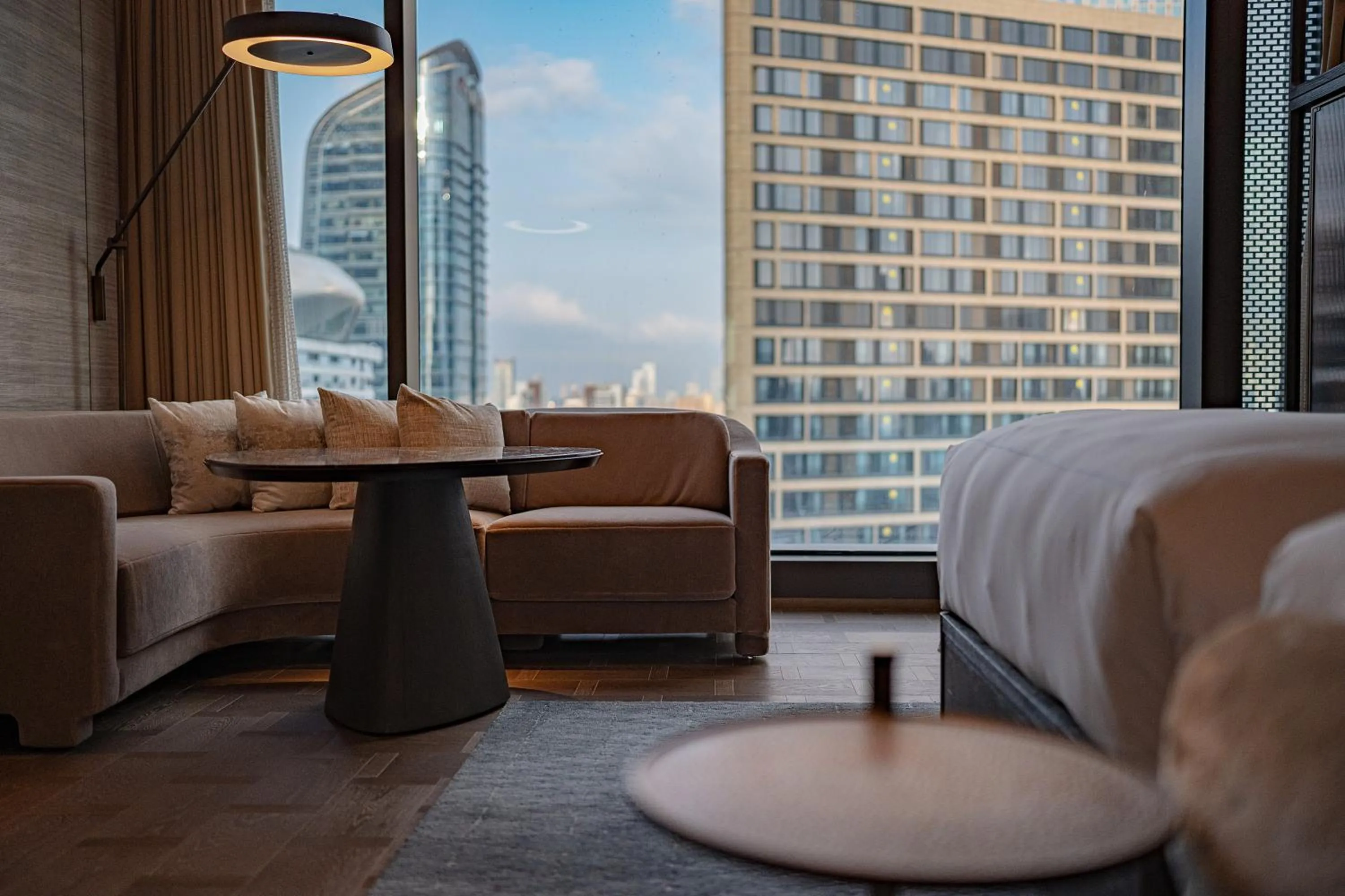 Seating area, Bed in Conrad Shenzhen, the first art museum hotel in Greater Bay Area with the stunning bay and sunset view in the hotel terrace