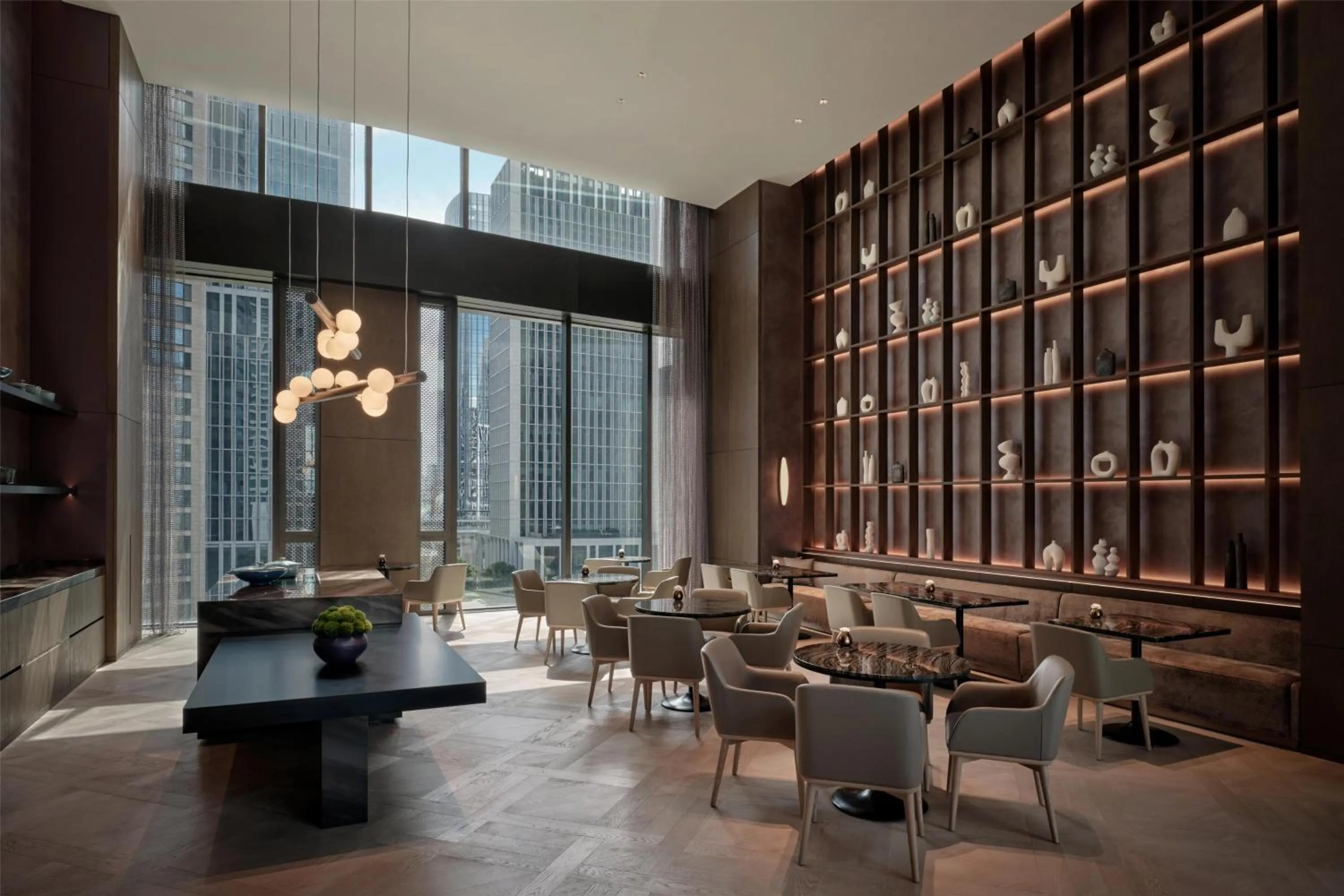 Property building in Conrad Shenzhen, the first art museum hotel in Greater Bay Area with the stunning bay and sunset view in the hotel terrace