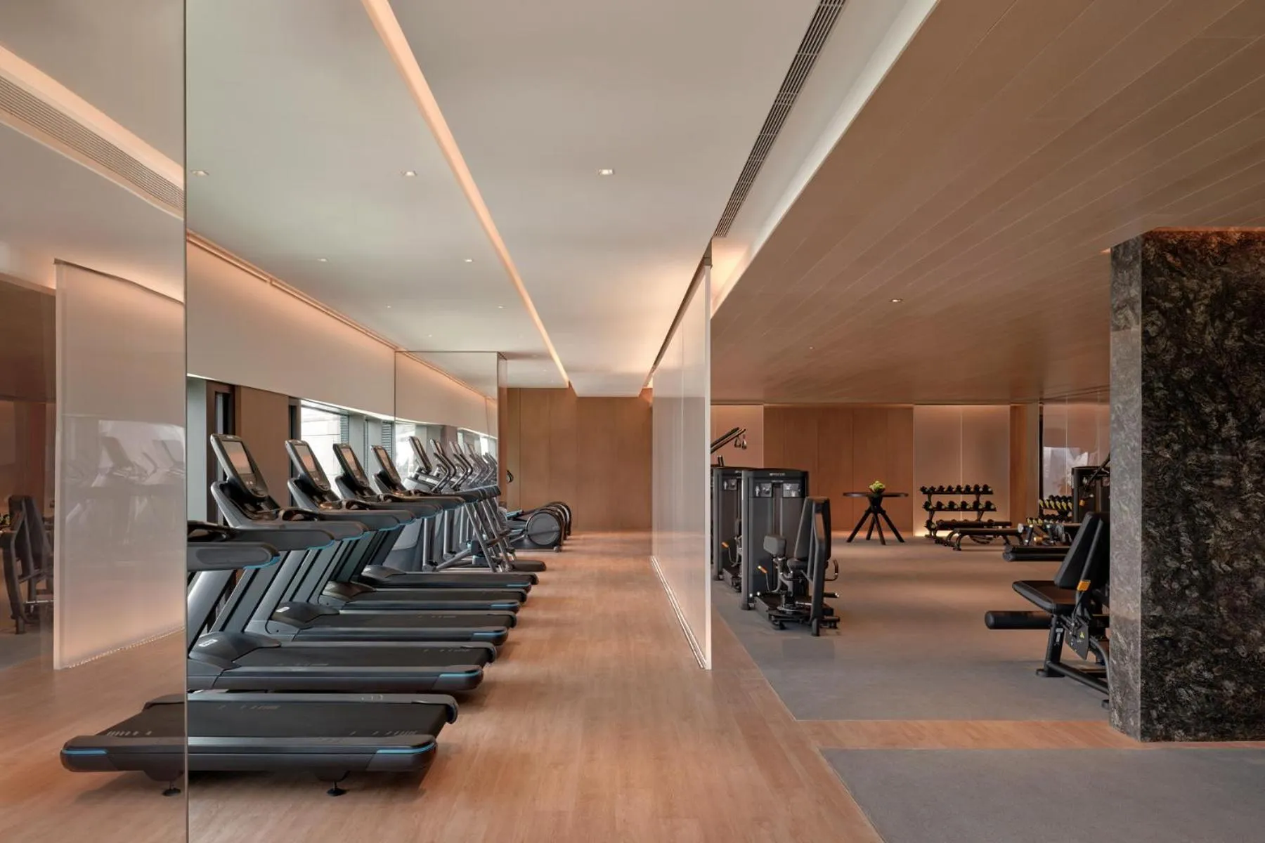 Fitness centre/facilities in Conrad Shenzhen, the first art museum hotel in Greater Bay Area with the stunning bay and sunset view in the hotel terrace