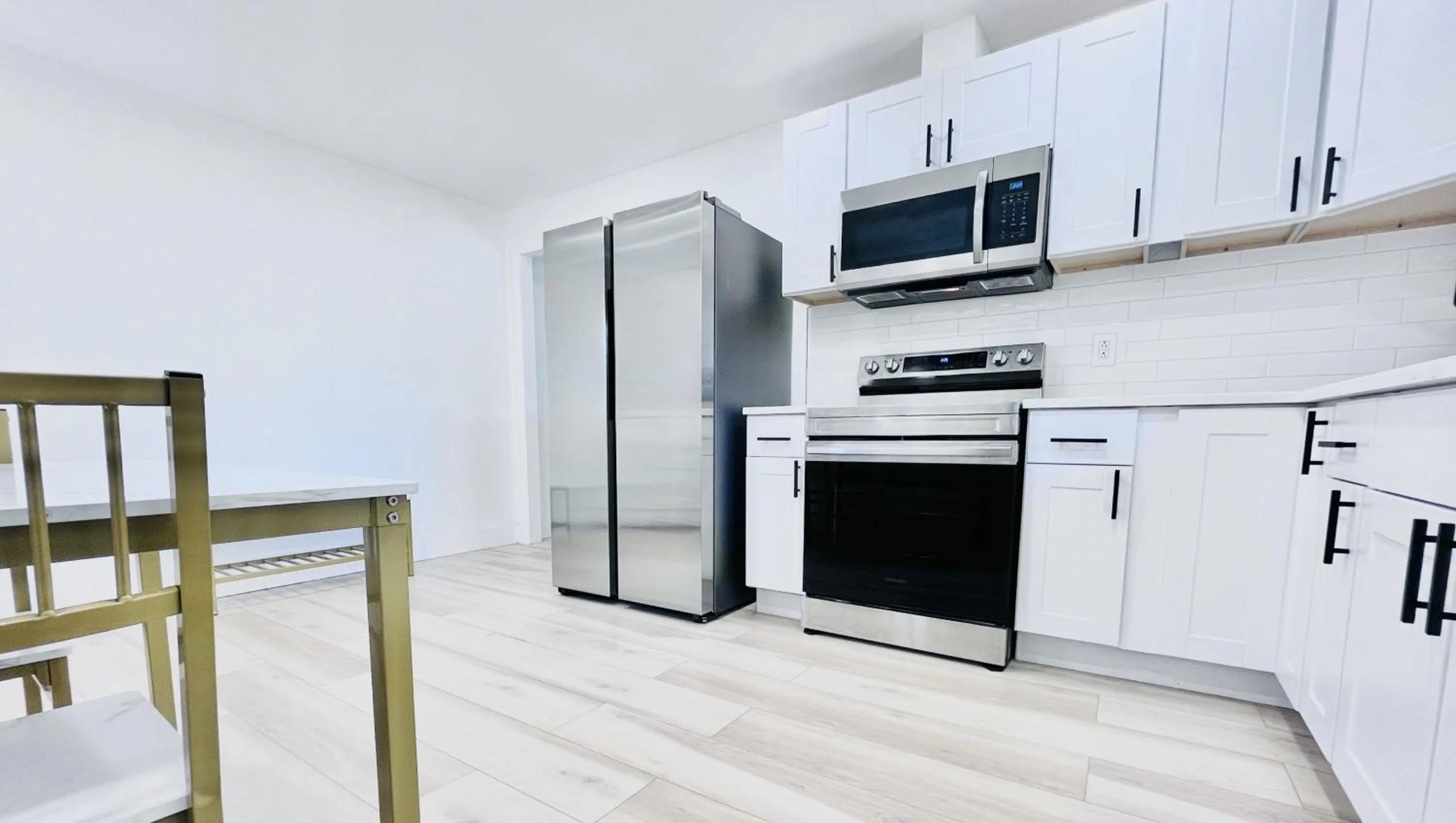 Kitchen or kitchenette in Motel Luzerne