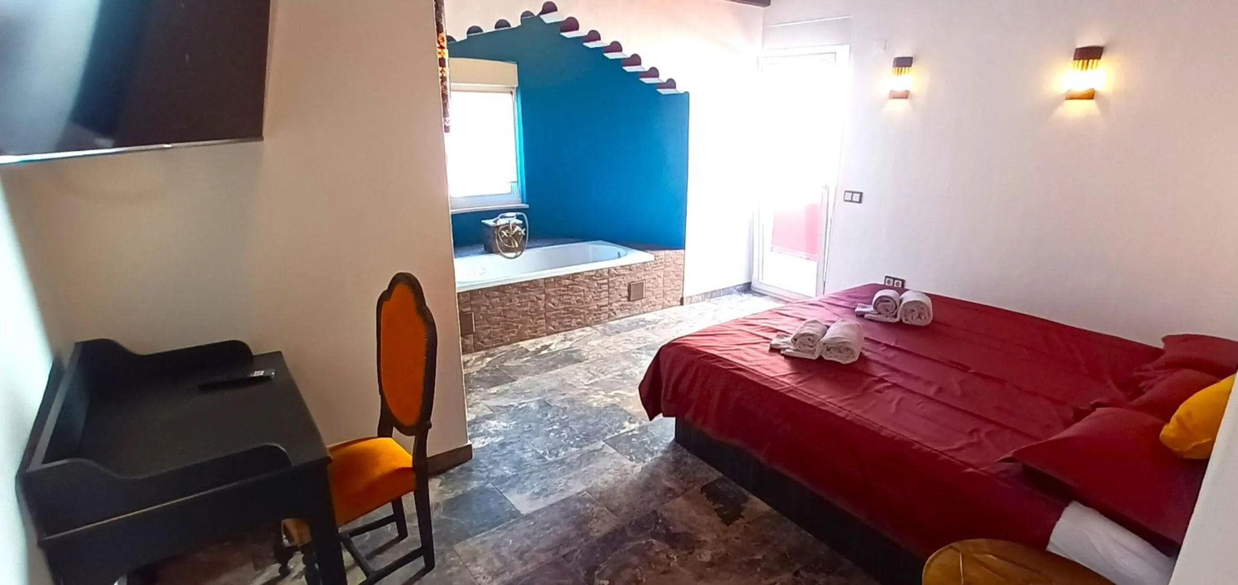 Bed in Aladin Comfort Country Rooms