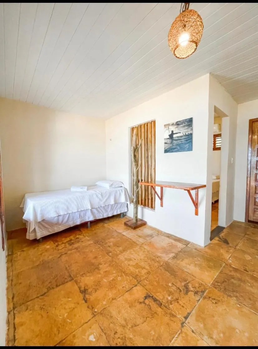 Bed in Pousada Estrela Peroba