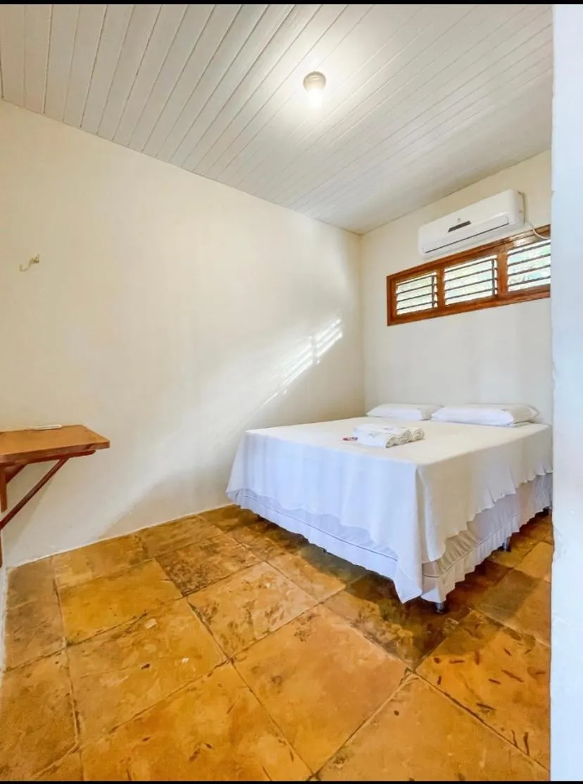 Bed in Pousada Estrela Peroba
